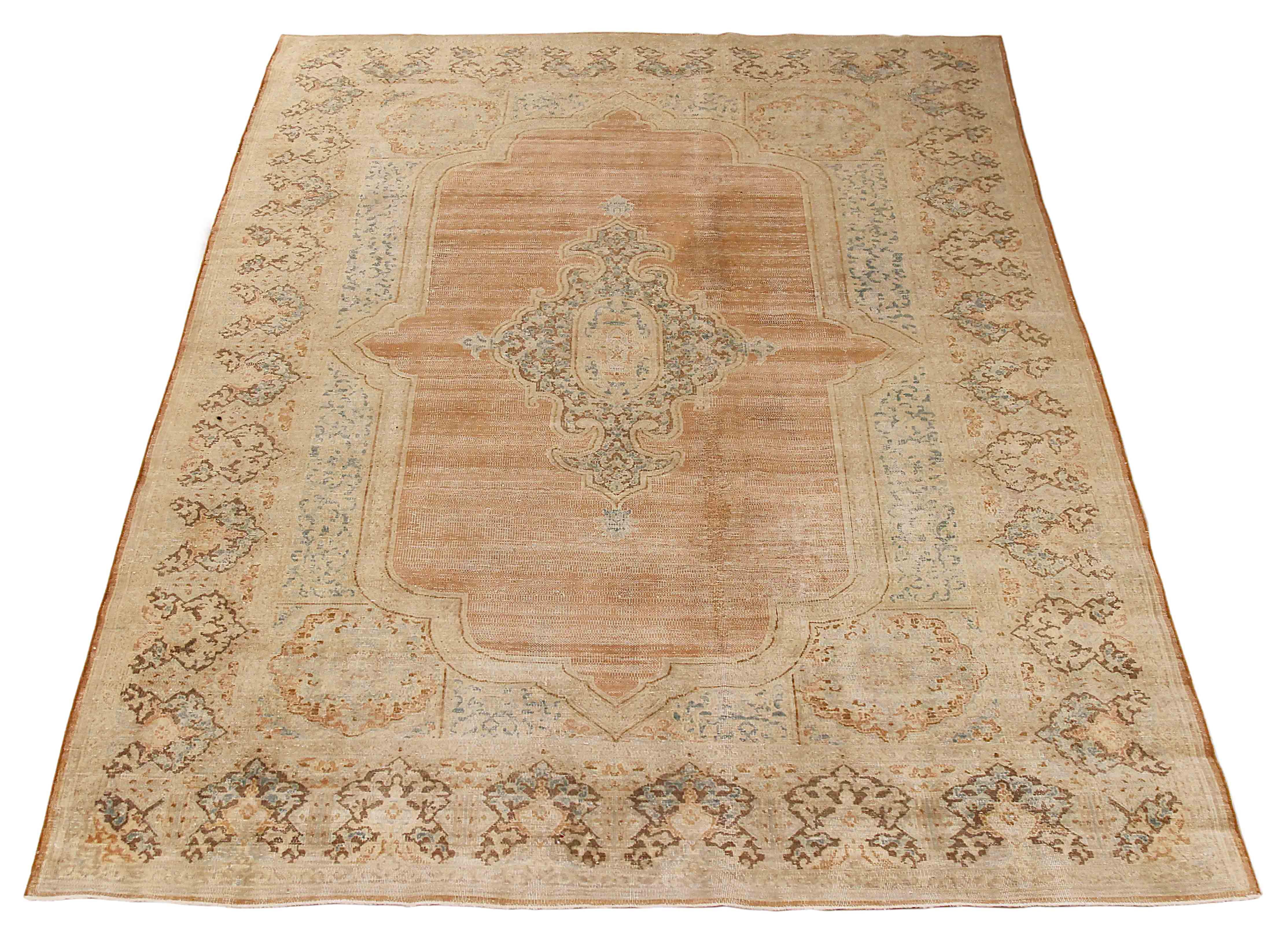 Antique Persian area rug handwoven from the finest sheep’s wool. It’s colored with all-natural vegetable dyes that are safe for humans and pets. It’s a traditional Overdye design handwoven by expert artisans. It’s a lovely area rug that can be