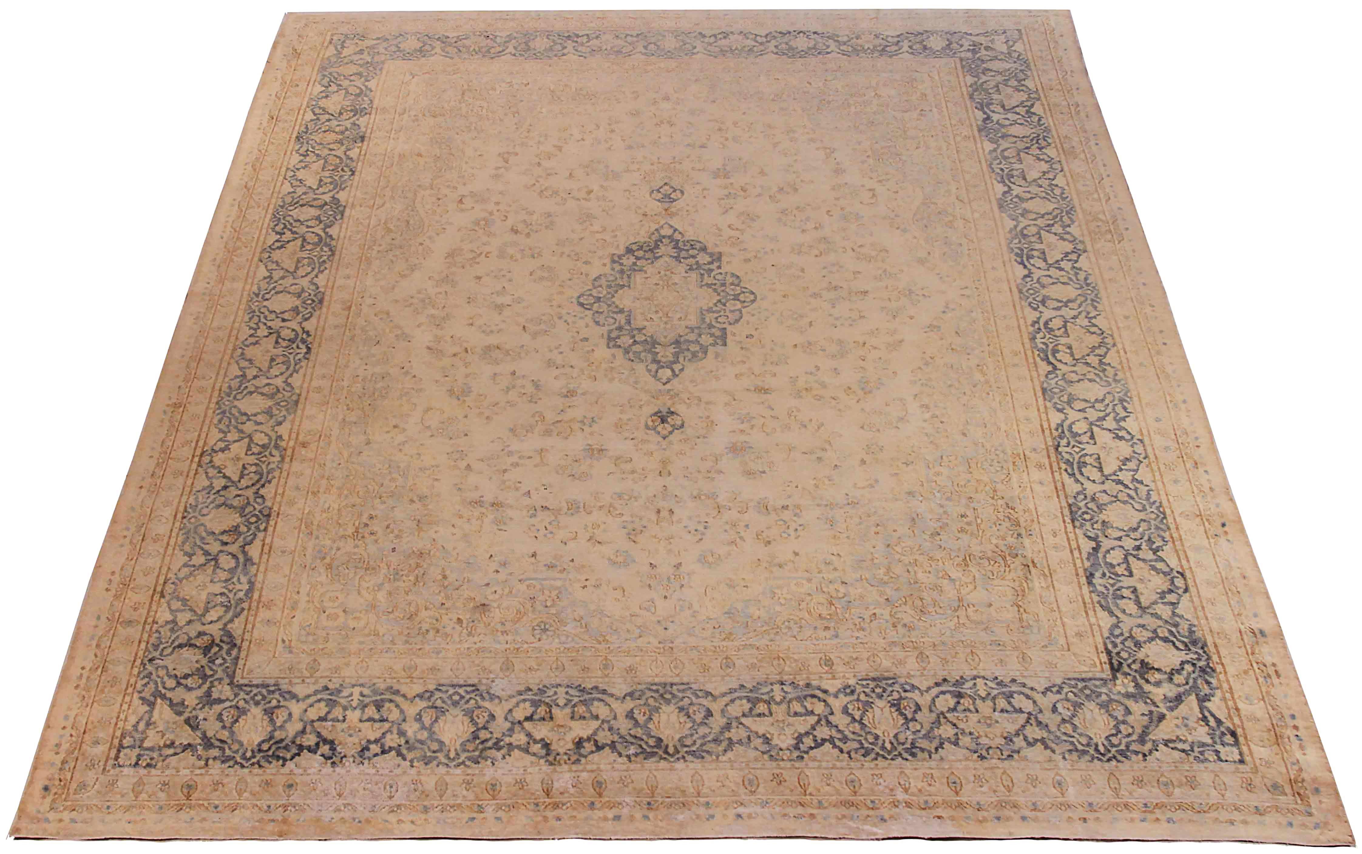 Antique Persian area rug handwoven from the finest sheep’s wool. It’s colored with all-natural vegetable dyes that are safe for humans and pets. It’s a traditional Overdye design handwoven by expert artisans. It’s a lovely area rug that can be