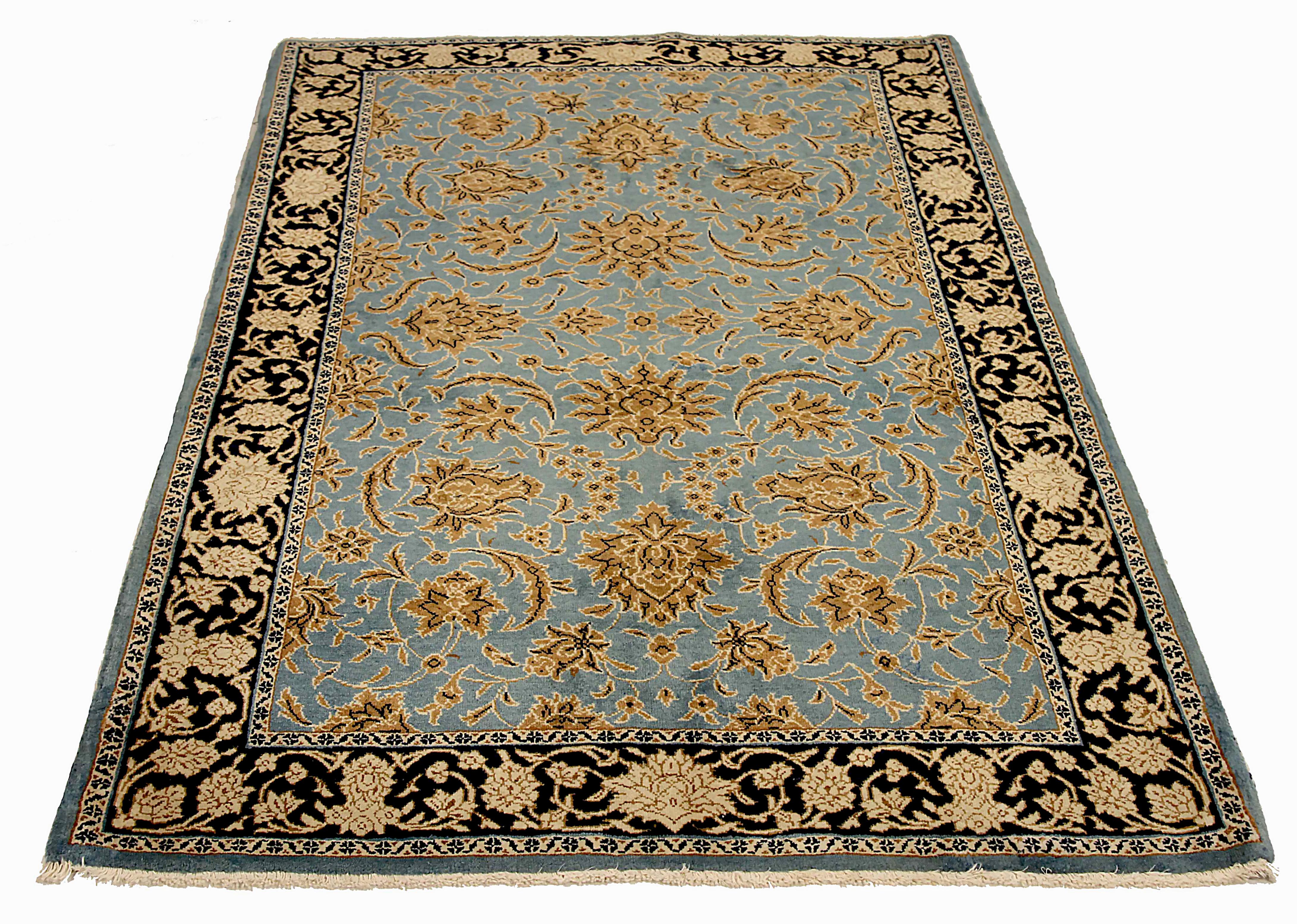 Antique Persian area rug handwoven from the finest sheep’s wool. It’s colored with all-natural vegetable dyes that are safe for humans and pets. It’s a traditional Sarouk design handwoven by expert artisans. It’s a lovely area rug that can be