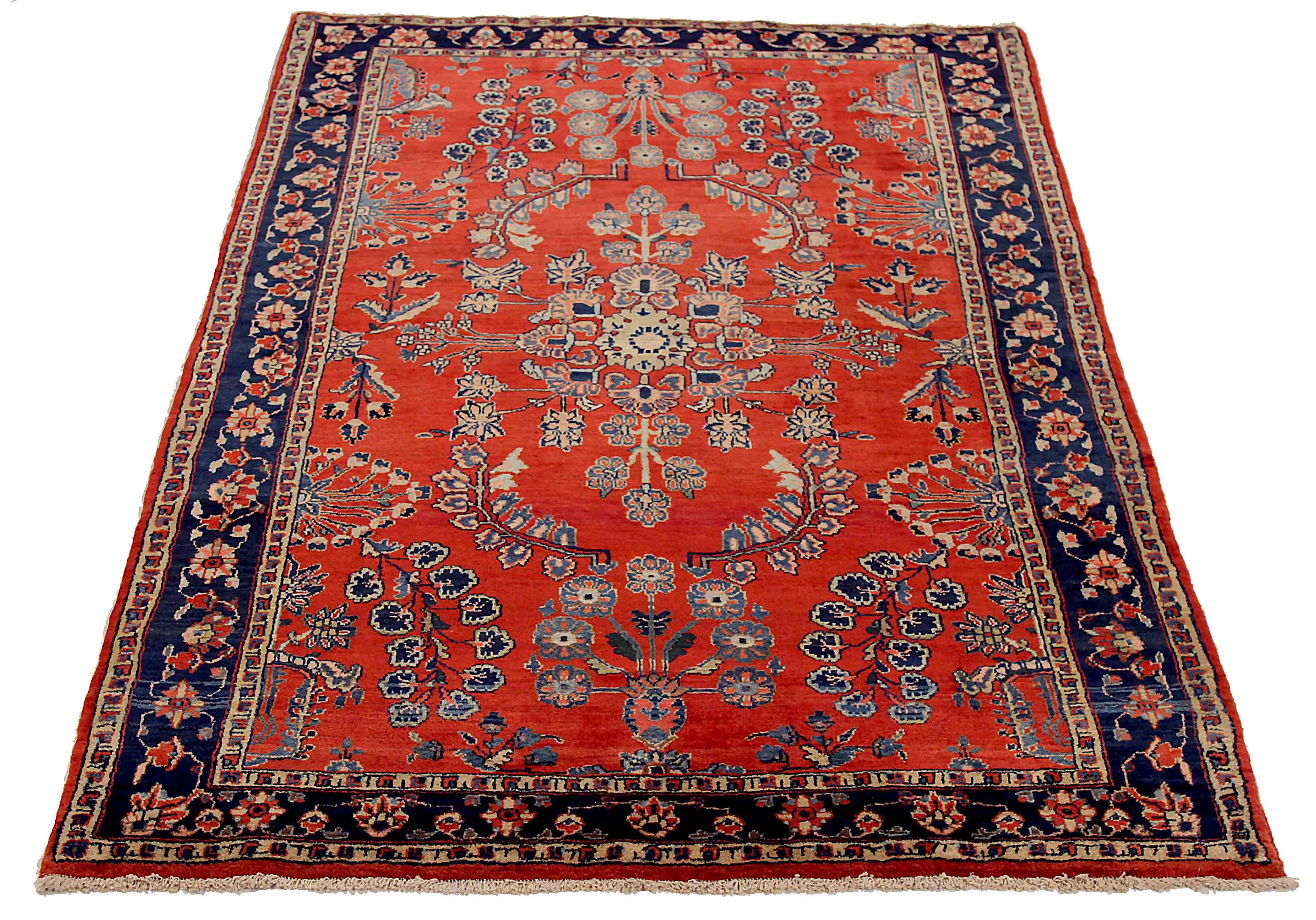 Antique Persian area rug handwoven from the finest sheep’s wool. It’s colored with all-natural vegetable dyes that are safe for humans and pets. It’s a traditional Sarouk design handwoven by expert artisans. It’s a lovely area rug that can be