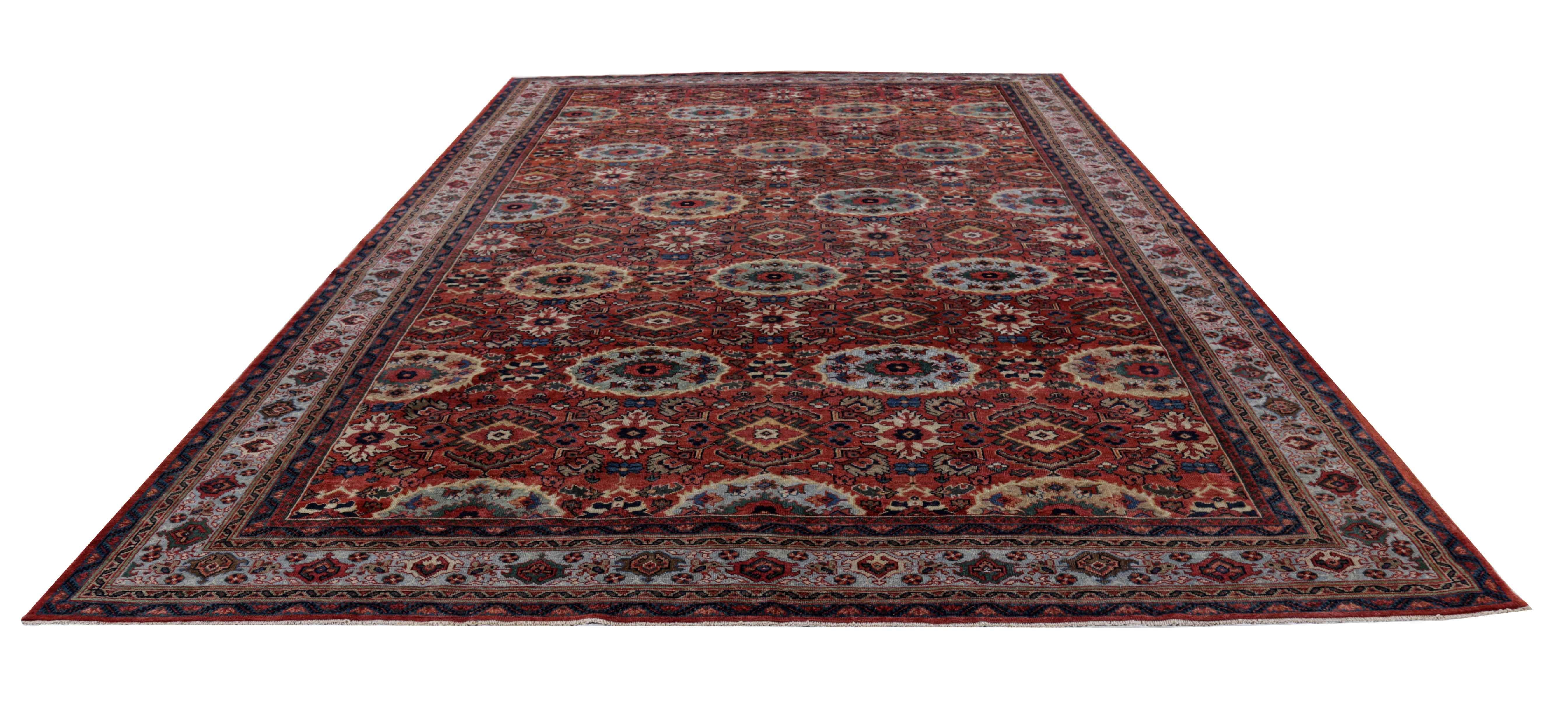 Antique Persian area rug handwoven from the finest sheep’s wool. It’s colored with all-natural vegetable dyes that are safe for humans and pets. It’s a traditional Sultanabad design handwoven by expert artisans. It’s a lovely area rug that can be