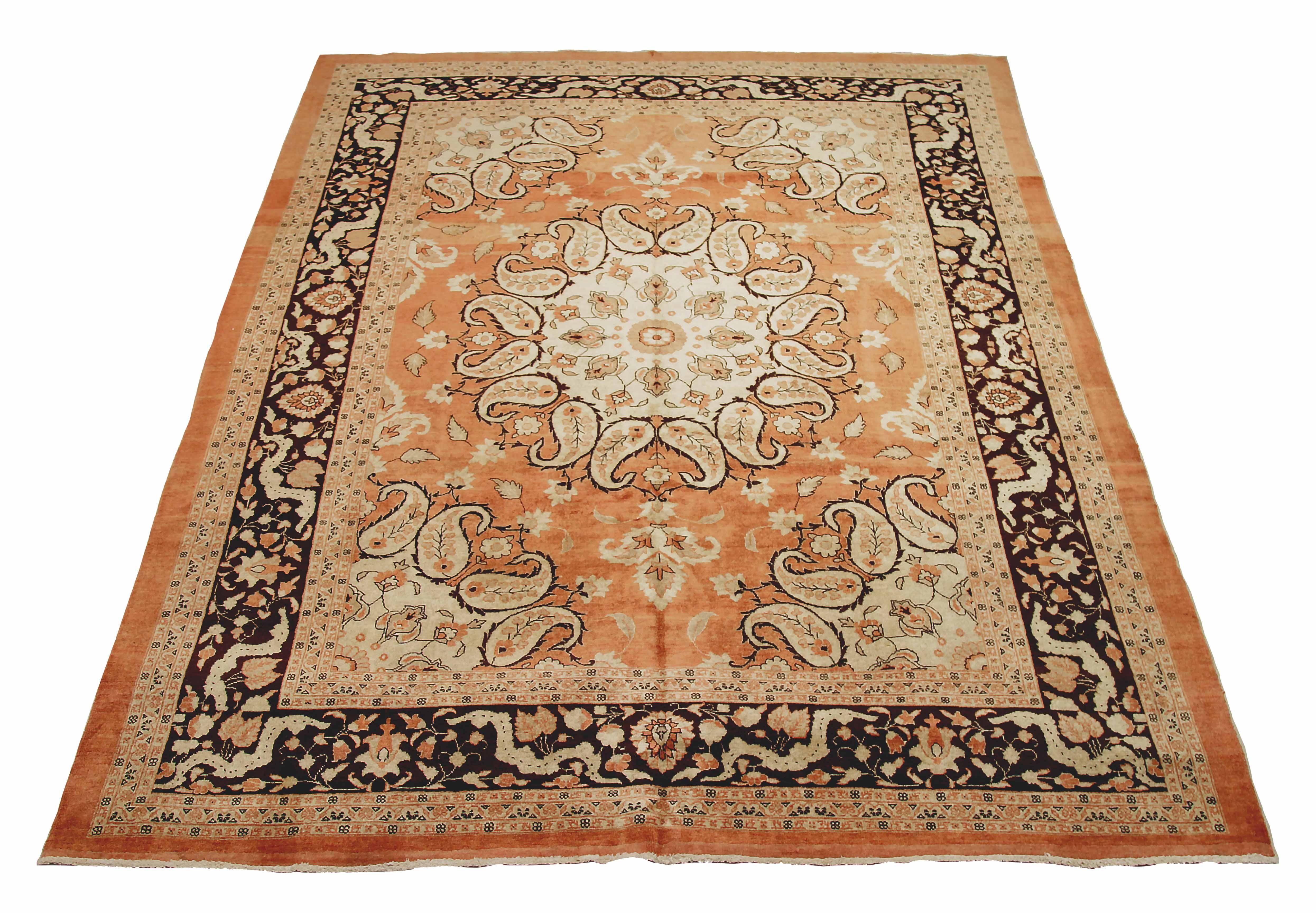 Antique Persian area rug handwoven from the finest sheep’s wool. It’s colored with all-natural vegetable dyes that are safe for humans and pets. It’s a traditional Tabriz design handwoven by expert artisans. It’s a lovely area rug that can be