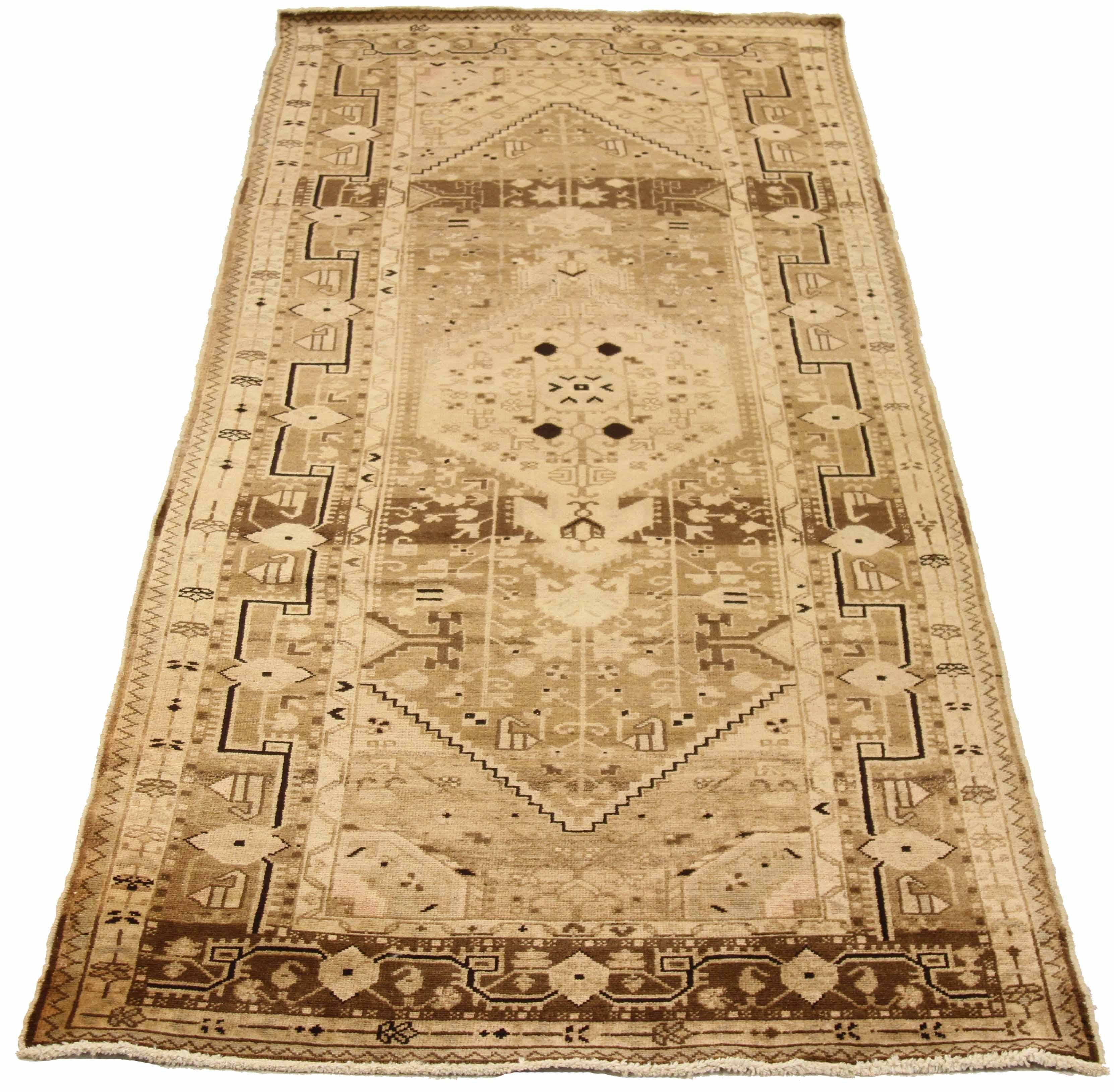 Antique Persian area rug handwoven from the finest sheep’s wool. It’s colored with all-natural vegetable dyes that are safe for humans and pets. It’s a traditional Toiserkan design handwoven by expert artisans. It’s a lovely area rug that can be