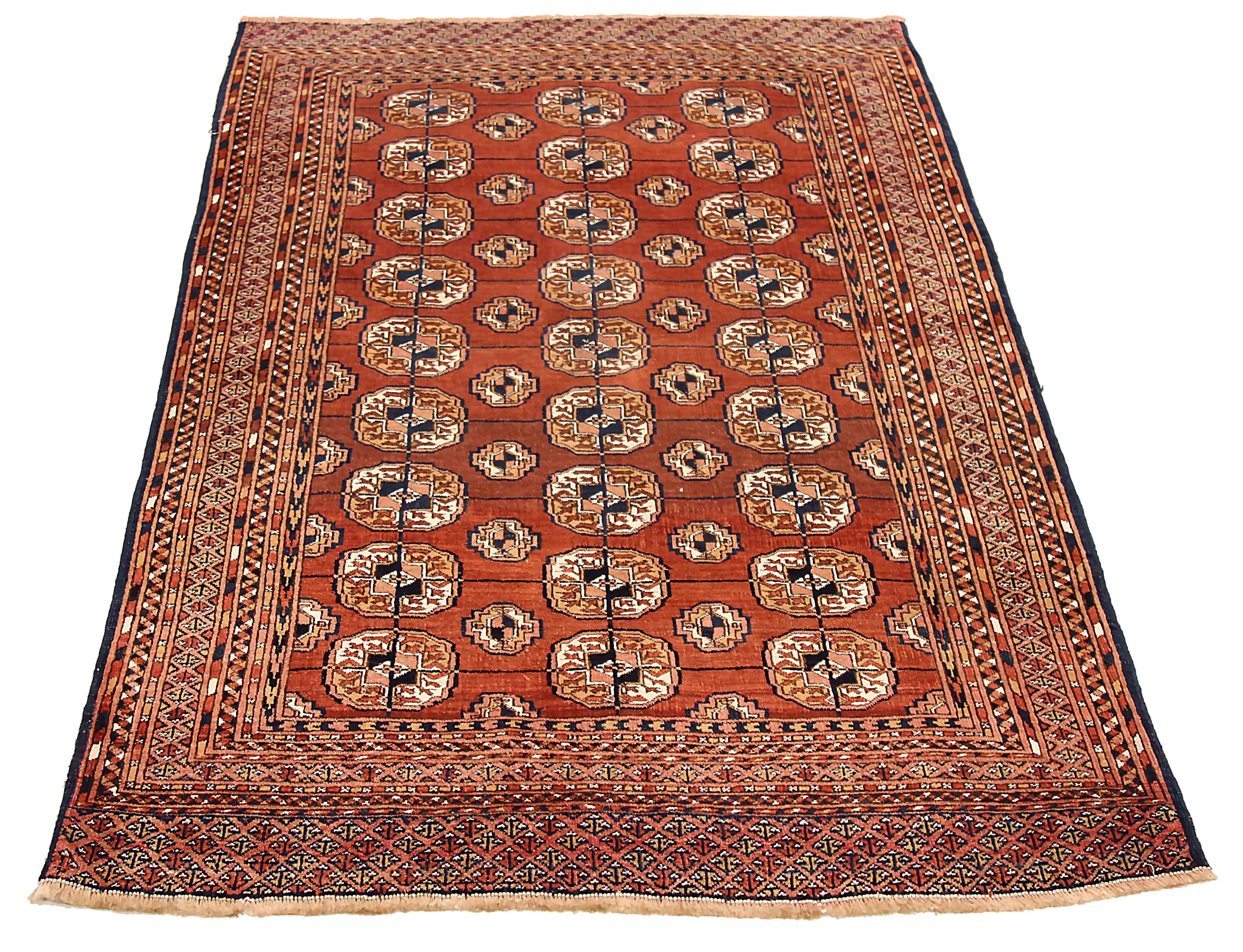 Antique Persian area rug handwoven from the finest sheep’s wool. It’s colored with all-natural vegetable dyes that are safe for humans and pets. It’s a traditional Turkeman design handwoven by expert artisans. It’s a lovely area rug that can be