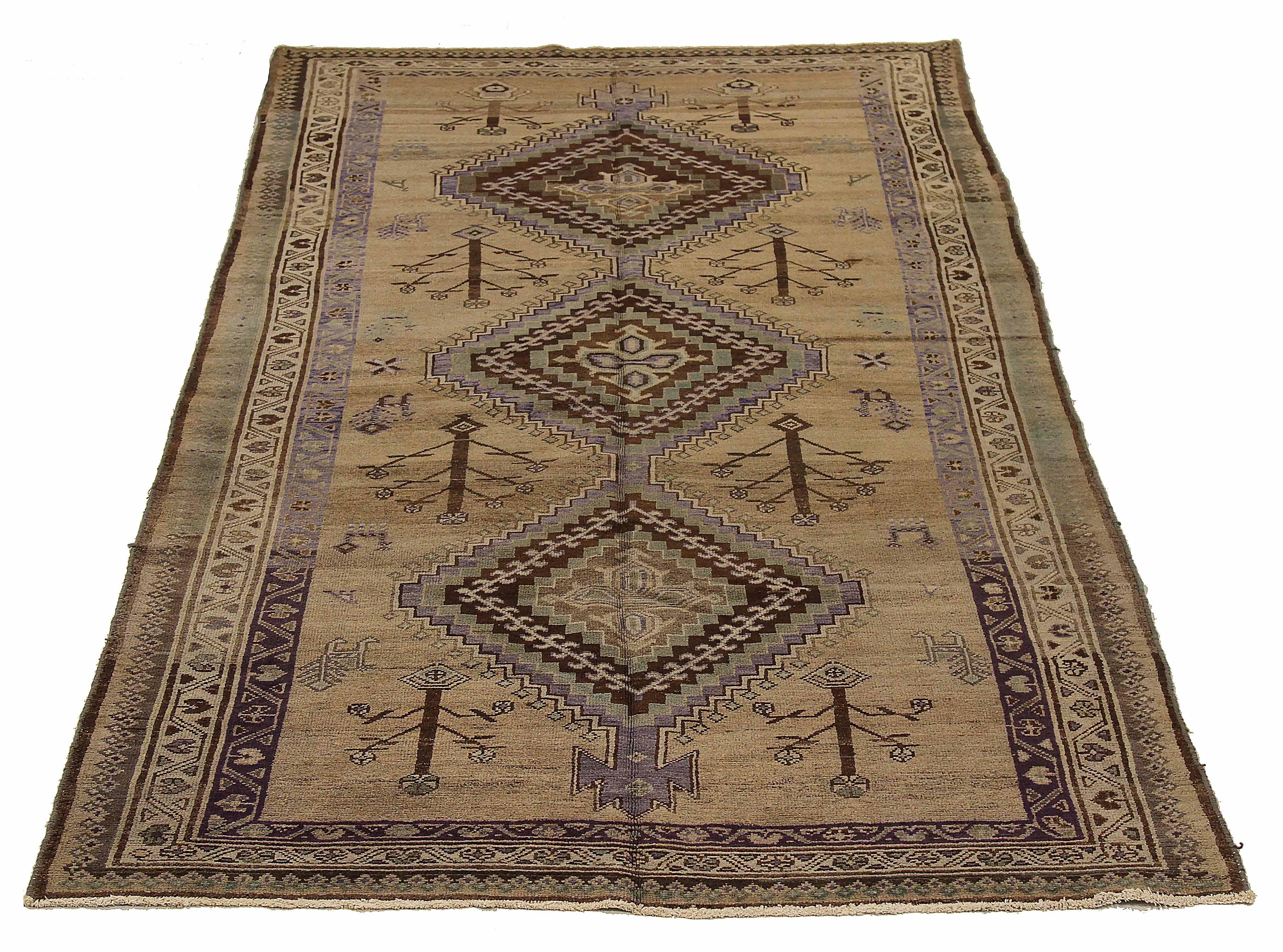 Antique Persian area rug handwoven from the finest sheep’s wool. It’s colored with all-natural vegetable dyes that are safe for humans and pets. It’s a traditional Varamin design handwoven by expert artisans. It’s a lovely area rug that can be