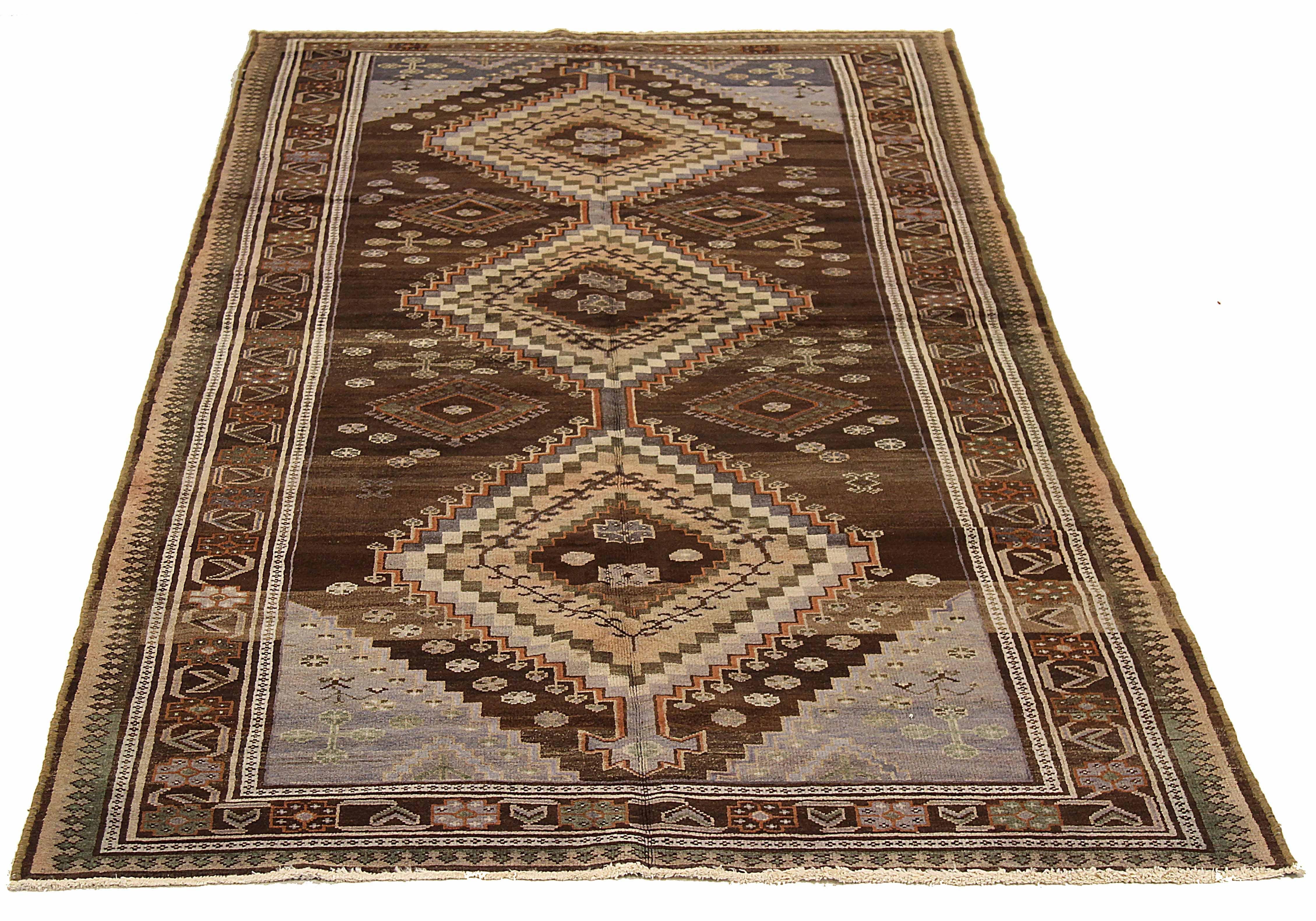 Antique Persian area rug handwoven from the finest sheep’s wool. It’s colored with all-natural vegetable dyes that are safe for humans and pets. It’s a traditional Varamin design handwoven by expert artisans. It’s a lovely area rug that can be