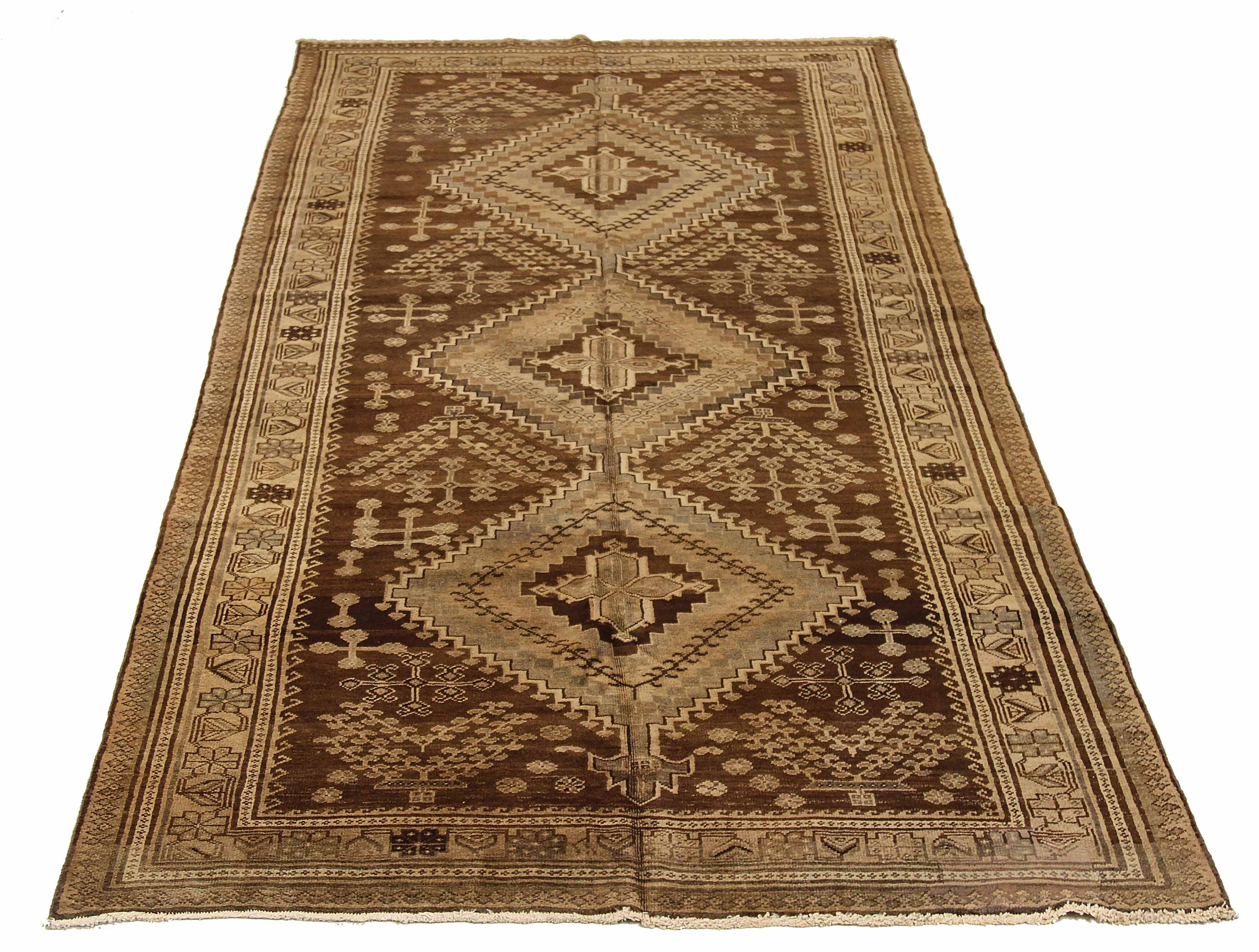 Antique Persian area rug handwoven from the finest sheep’s wool. It’s colored with all-natural vegetable dyes that are safe for humans and pets. It’s a traditional Varamin design handwoven by expert artisans. It’s a lovely area rug that can be