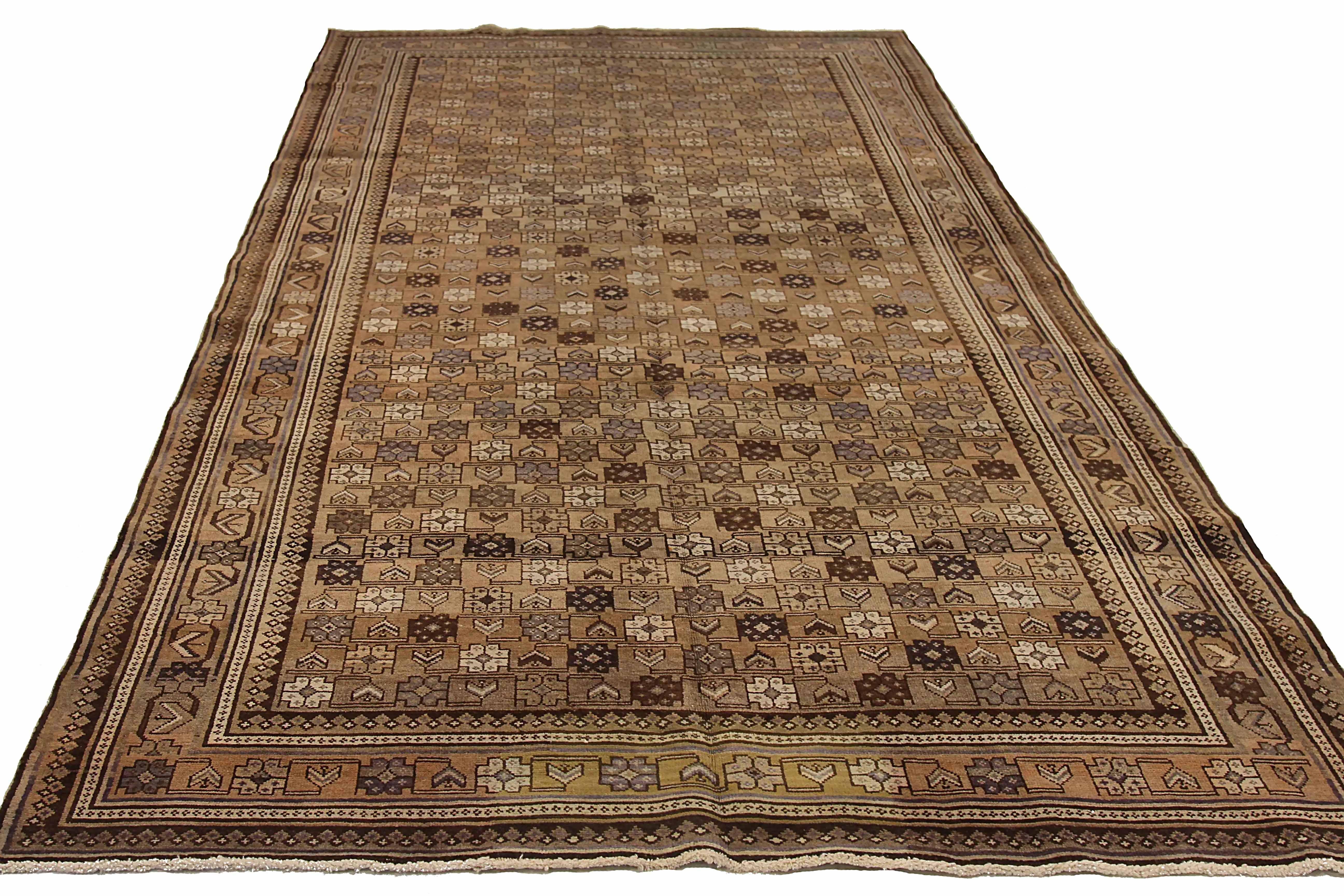 Antique Persian area rug handwoven from the finest sheep’s wool. It’s colored with all-natural vegetable dyes that are safe for humans and pets. It’s a traditional Varamin design handwoven by expert artisans. It’s a lovely area rug that can be