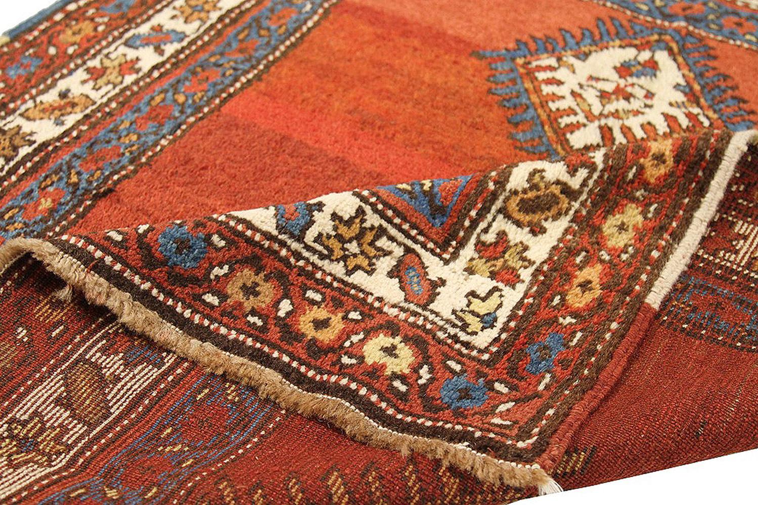 Hand-Woven Antique Persian Azerbaijan Rug with Blue and Red Floral Details on Ivory Field For Sale