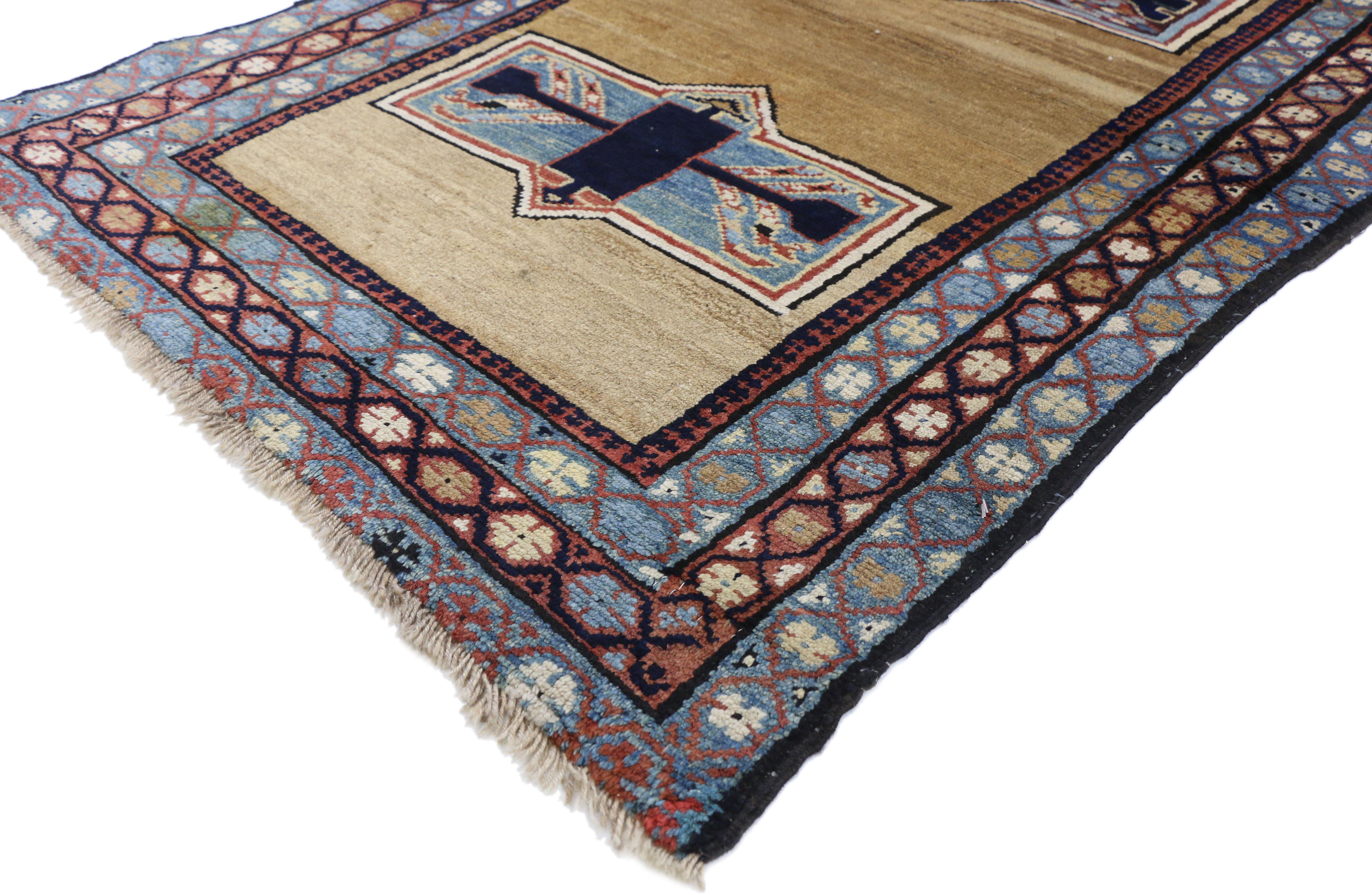 75633, antique Persian Azerbaijan rug with Tribal Mid-Century Modern style. This hand knotted wool antique Persian Azerbaijan rug features two decagonal medallions floating on an abrashed beige field. Two rectangles with Arabic signatures appear at