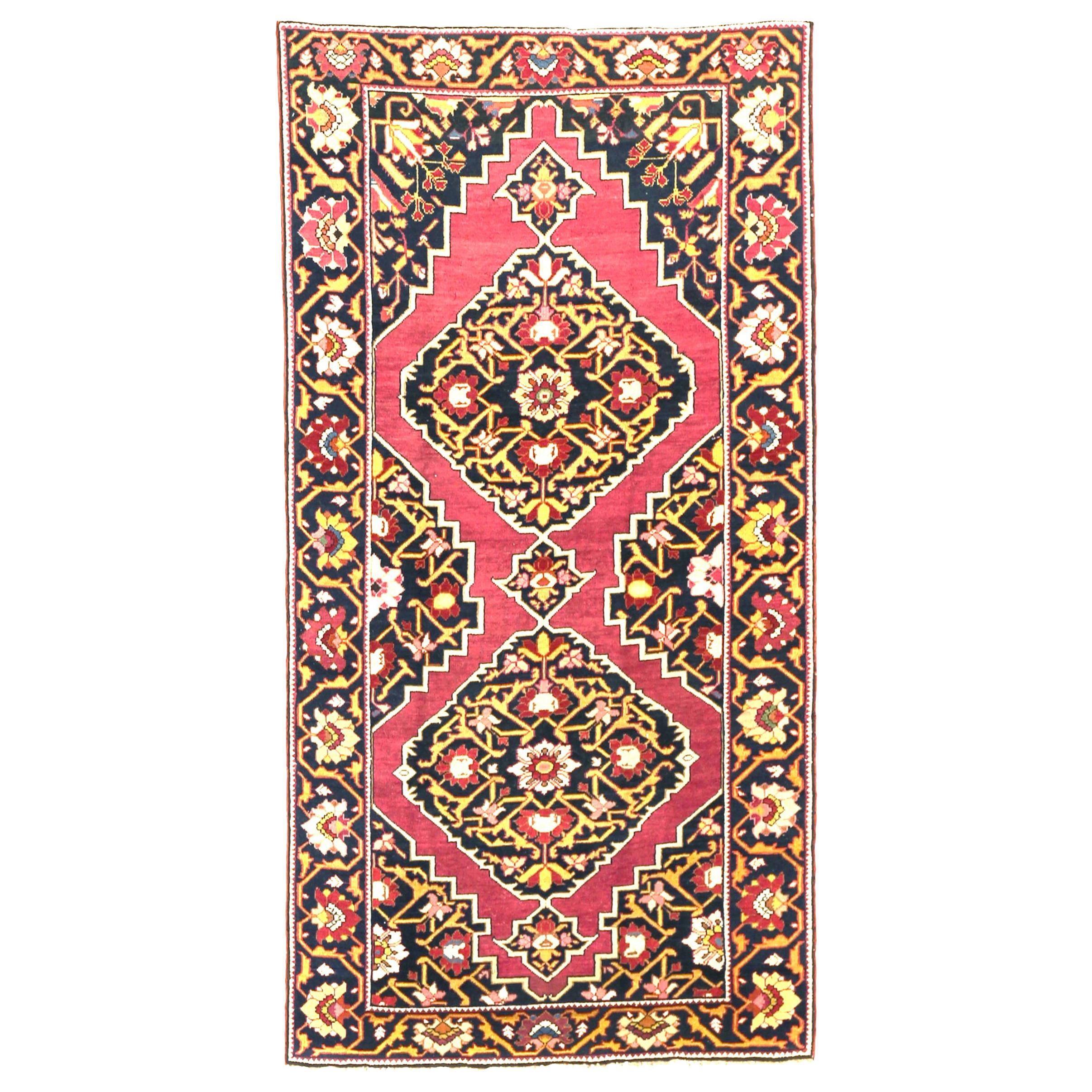 Antique Persian Azerbaijan Area Rug with Floral Pattern on a Black Field For Sale