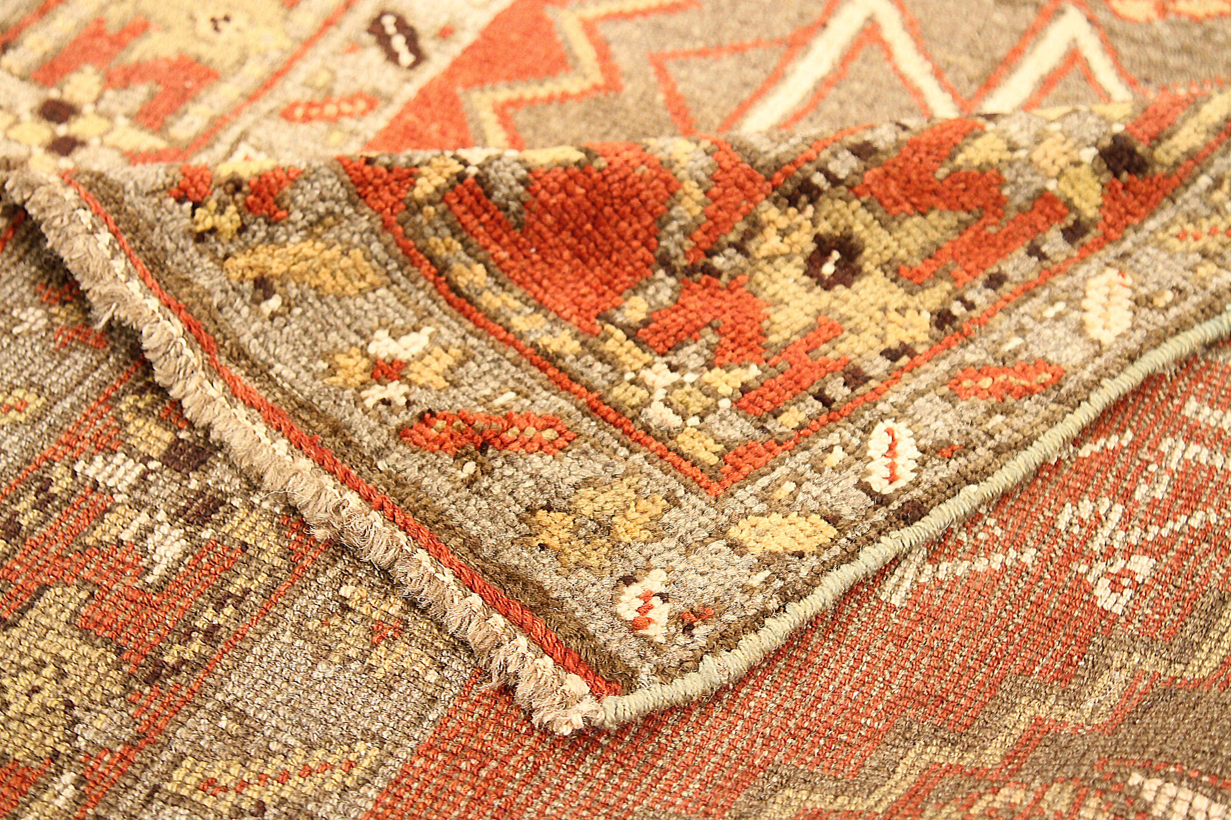 Hand-Woven Antique Persian Azerbaijan Area Rug with Tribal Design on Red Field For Sale