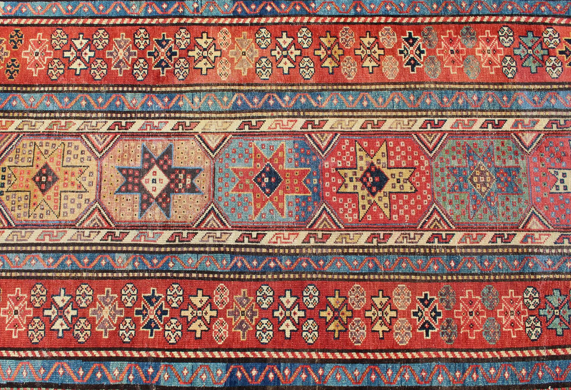 Antique Persian Kazak Runner with Medallions in Red, Blue, and Yellow For Sale 4