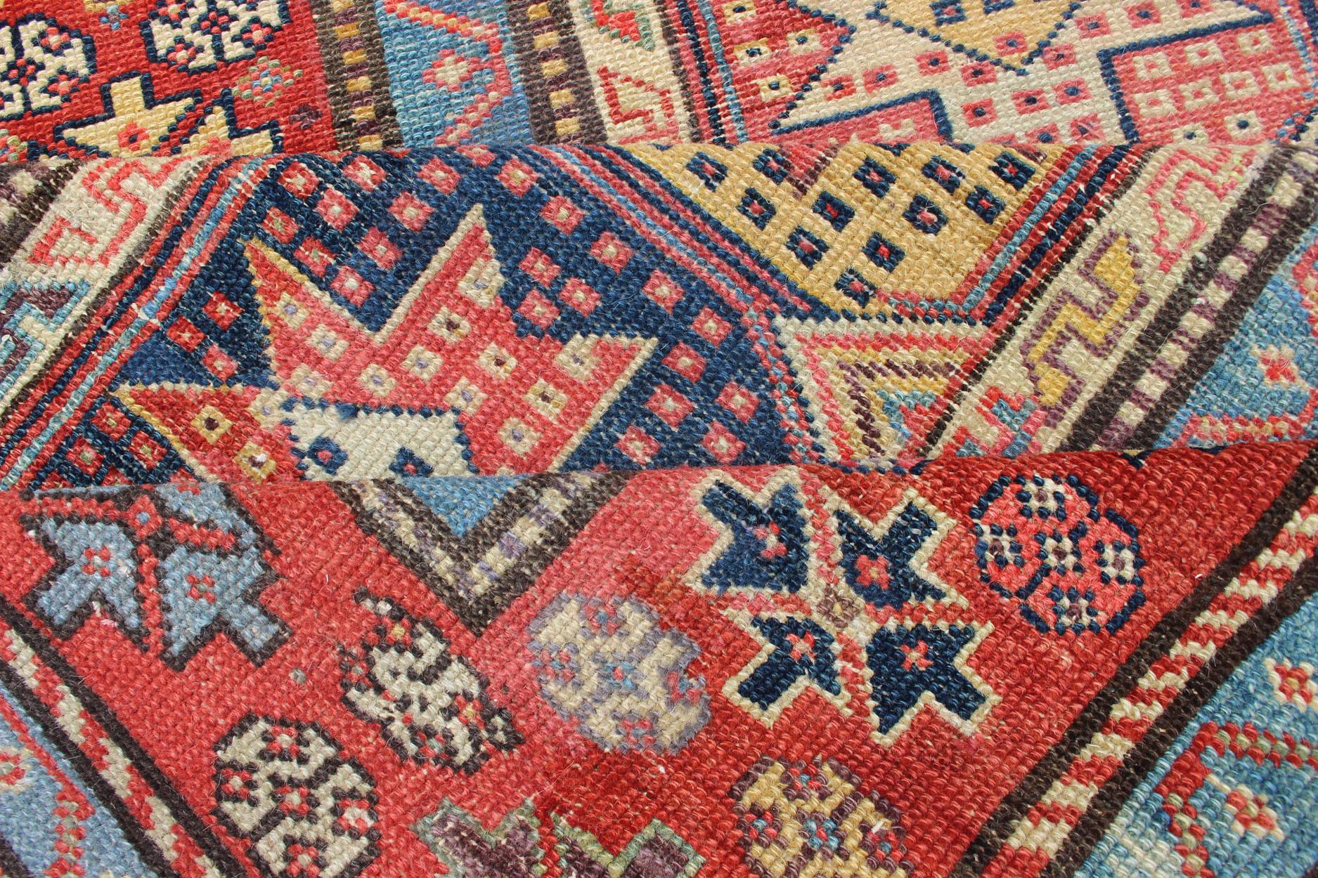 Antique Persian Kazak Runner with Medallions in Red, Blue, and Yellow For Sale 5