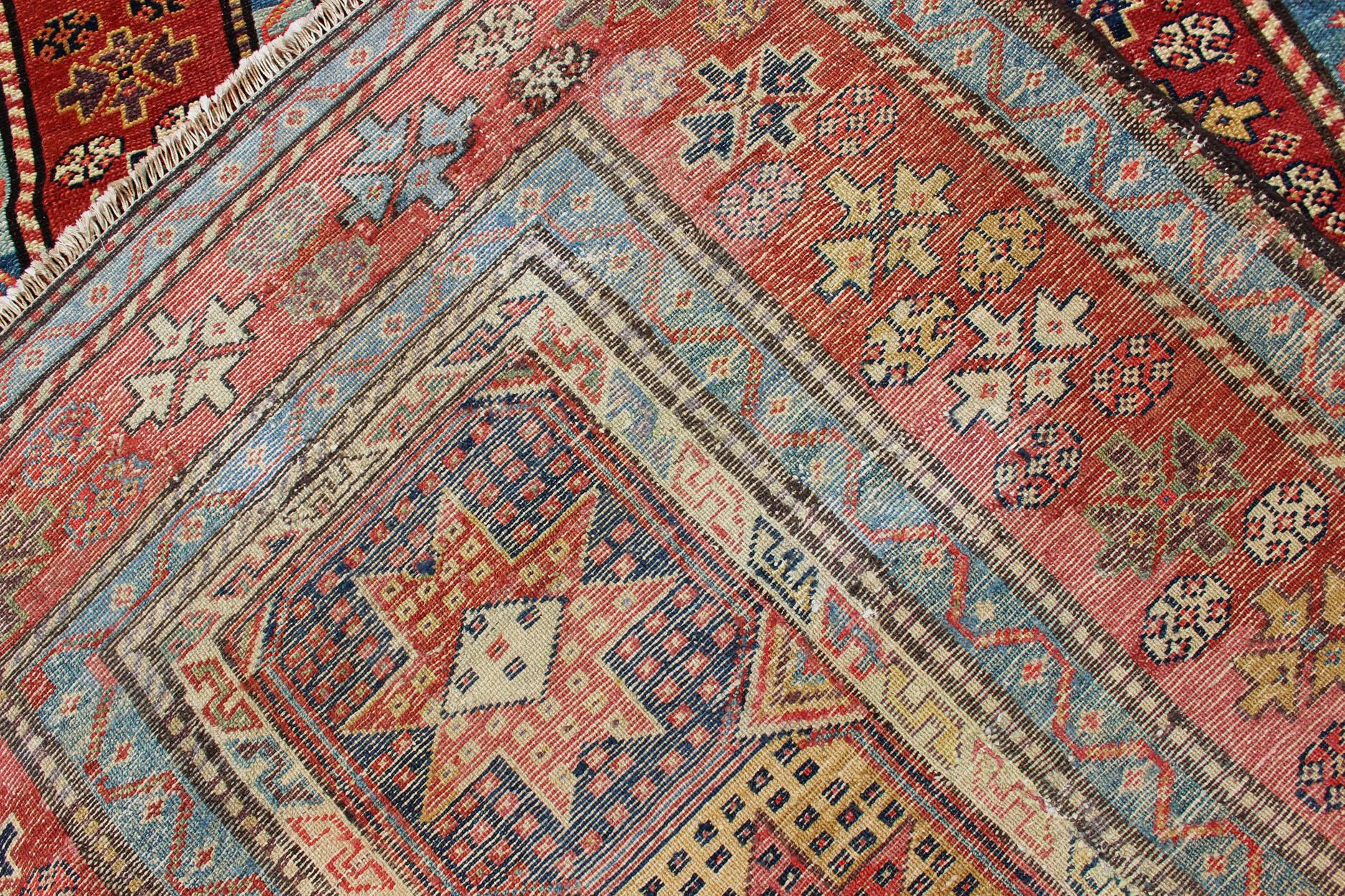 Antique Persian Kazak Runner with Medallions in Red, Blue, and Yellow For Sale 6