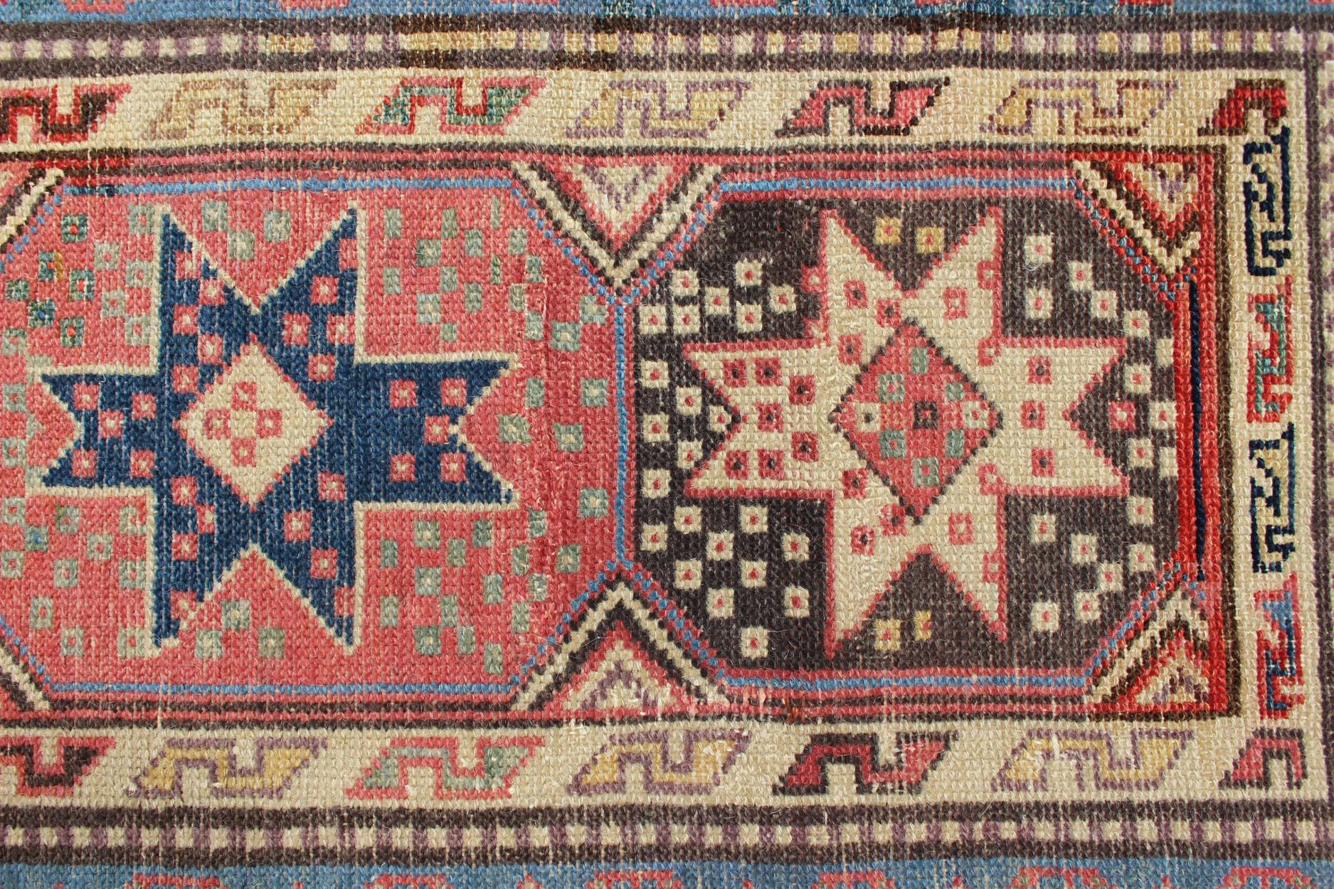 Antique Persian Kazak Runner with Medallions in Red, Blue, and Yellow For Sale 1