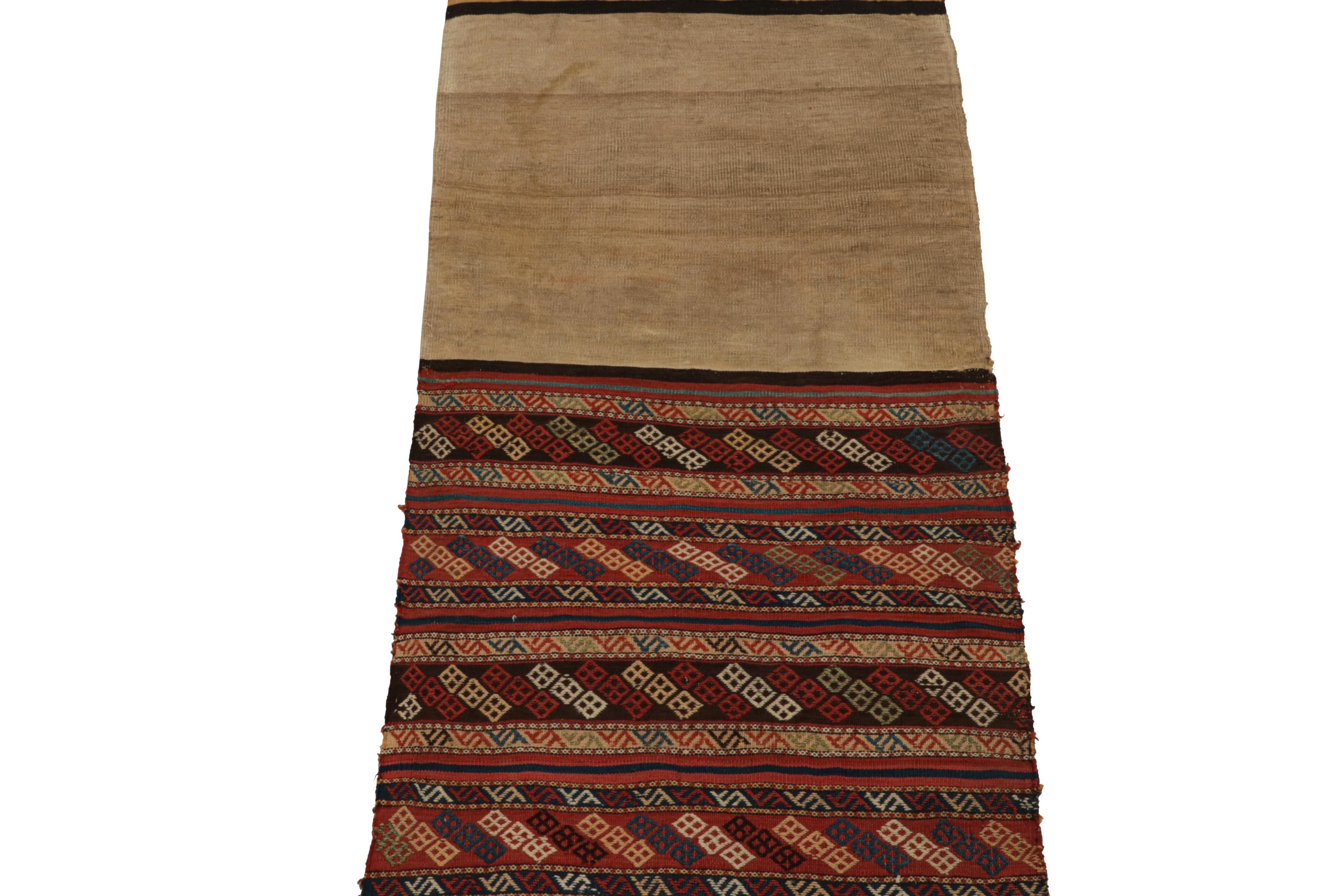 Handwoven in wool circa 1910-1920, this 3x6 Kilim runner is an antique Persian bag—a collectible textile once used by nomadic tribes in their daily life.

On the Design:

Connoisseurs will note this piece has been opened up, similar to other tribal
