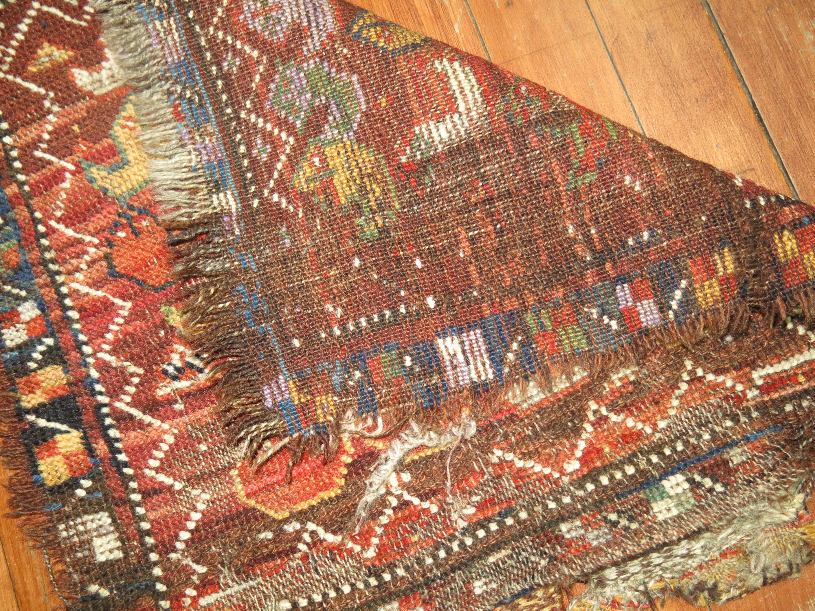 Antique Persian Bagface Rug In Distressed Condition In New York, NY