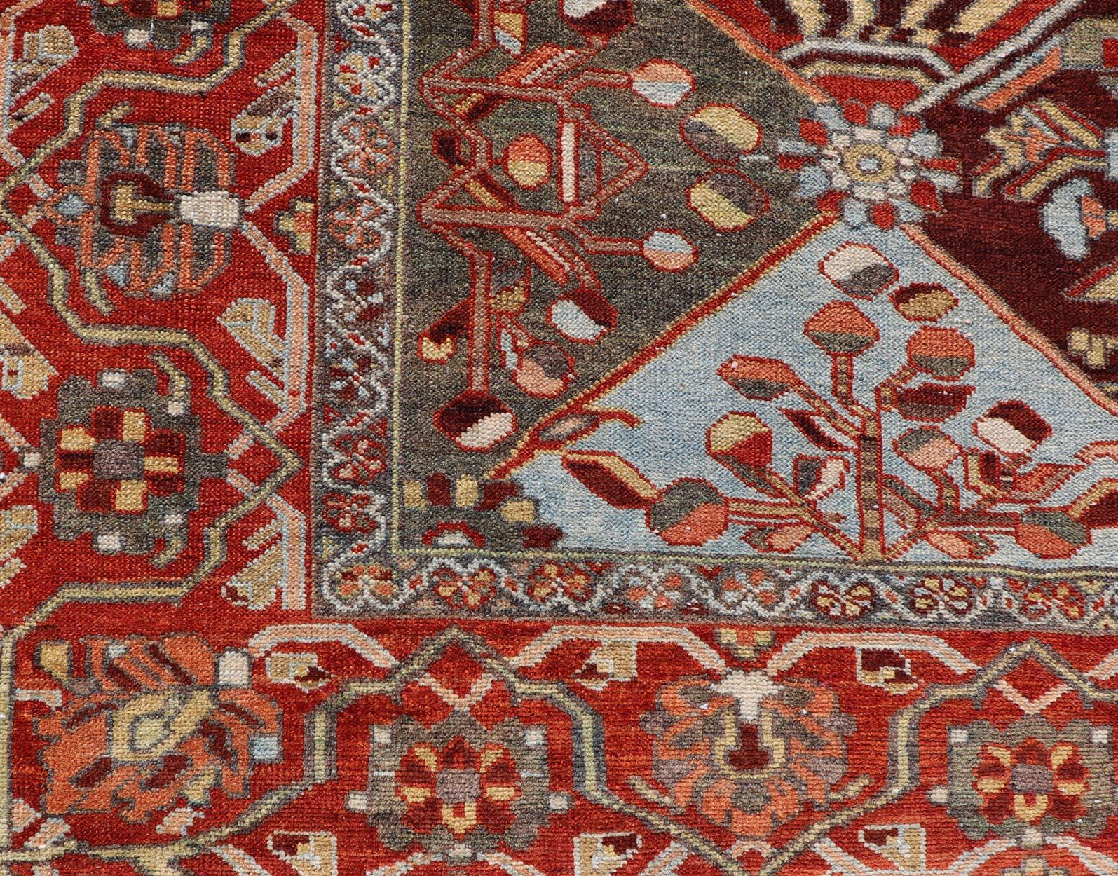 Measures: 5'0 x 8'0 
Antique Persian Bakhitari Colorful Rug in All-Over Diamond Garden Design. Keivan Woven Arts / rug EMB-22158-15045 origin / type: Iran / Bakhitari, circa 1920.

This beautiful Bakitari rug from Persia features an elaborate