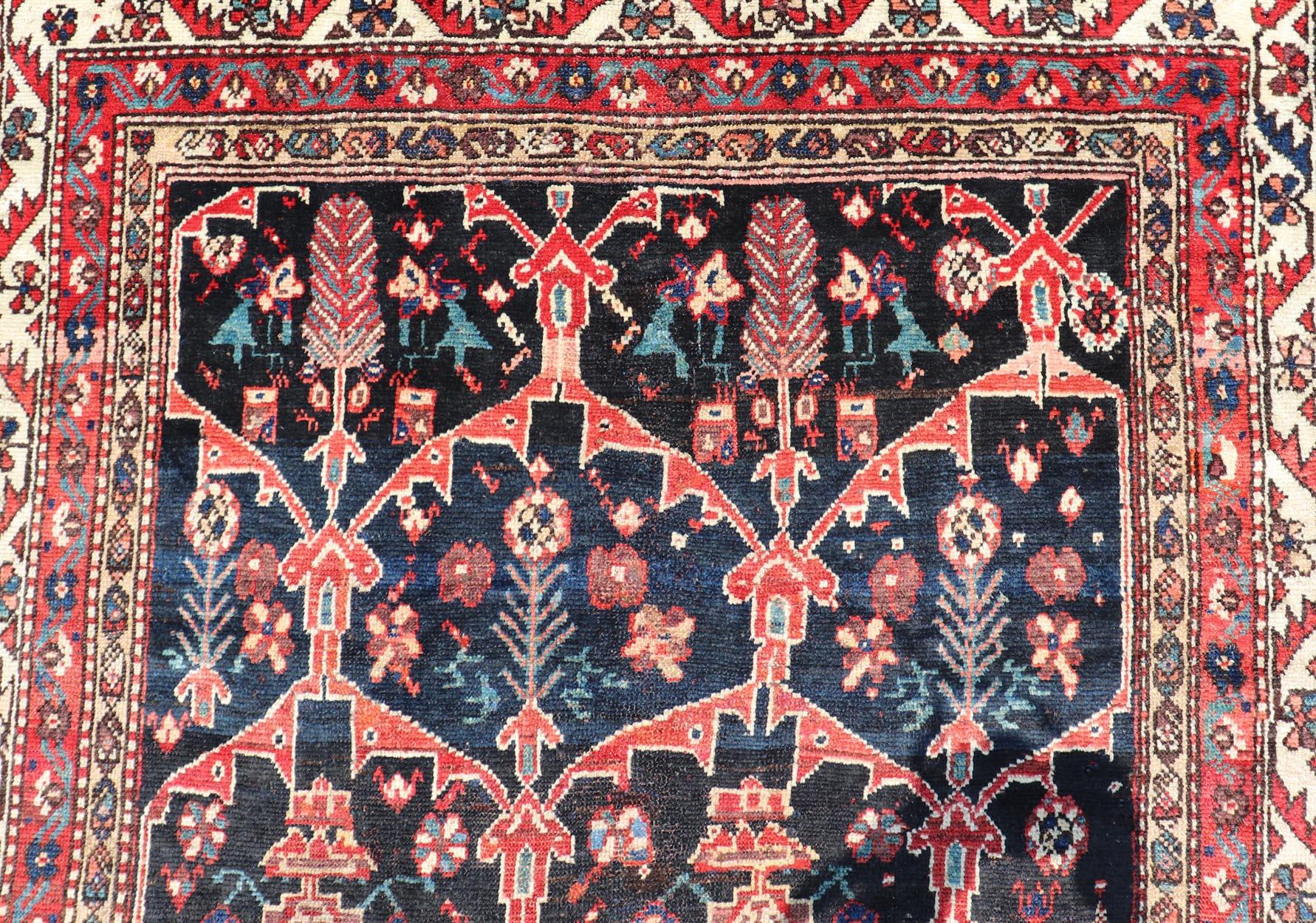 Hand-Knotted Antique Persian Bakhitari Colorful Rug with All-Over Floral Medallion Design  For Sale