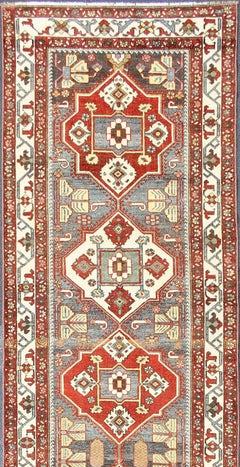 Antique Persian Bakhtiari Runner with Bold Geometric Medallions In Terracotta