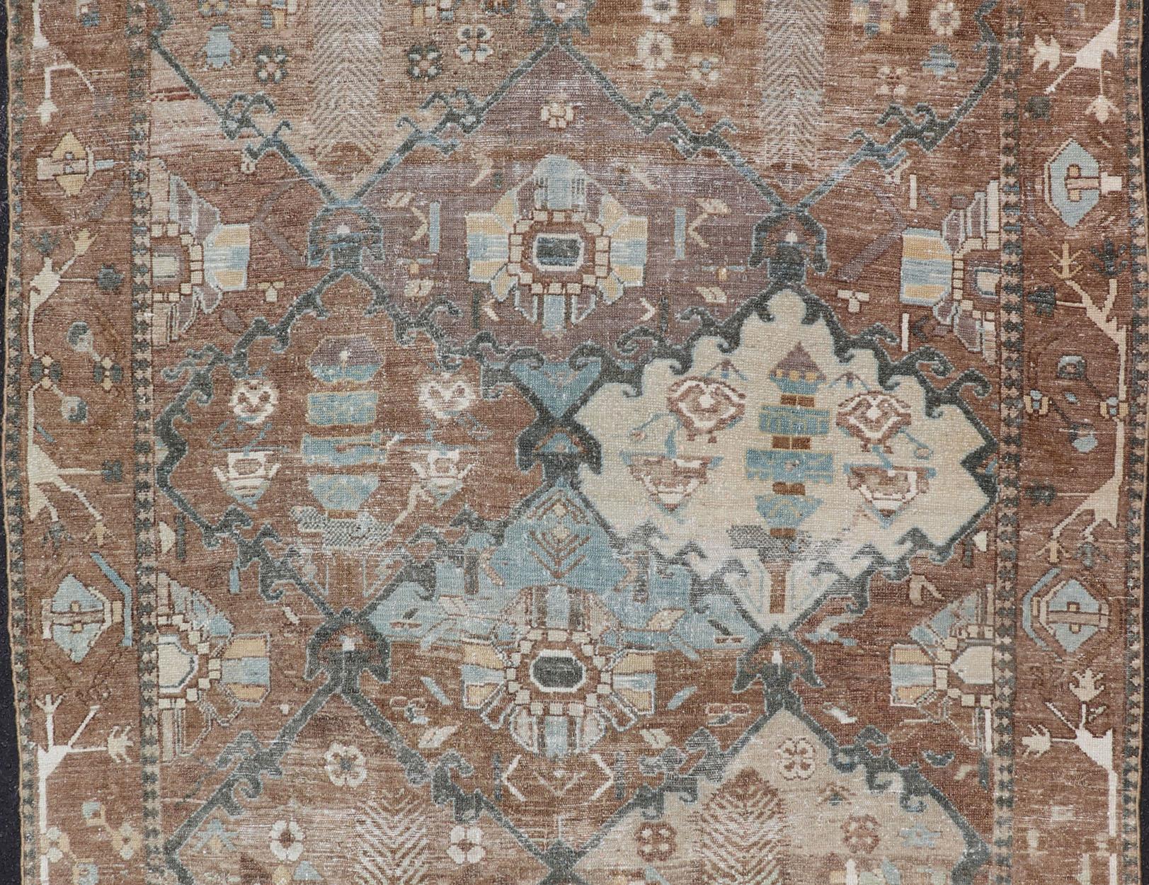 Bakshaish Antique Persian Bakhitari Rug with All-Over Patten in Earthy and Brown Tones