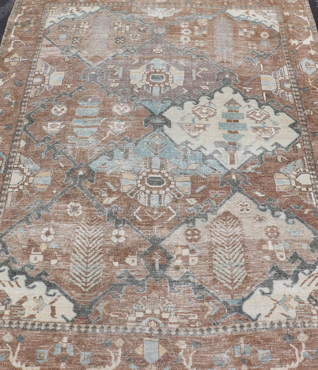 20th Century Antique Persian Bakhitari Rug with All-Over Patten in Earthy and Brown Tones