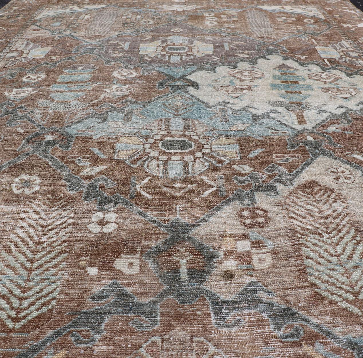 Wool Antique Persian Bakhitari Rug with All-Over Patten in Earthy and Brown Tones