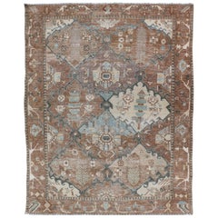 Antique Persian Bakhitari Rug with All-Over Patten in Earthy and Brown Tones