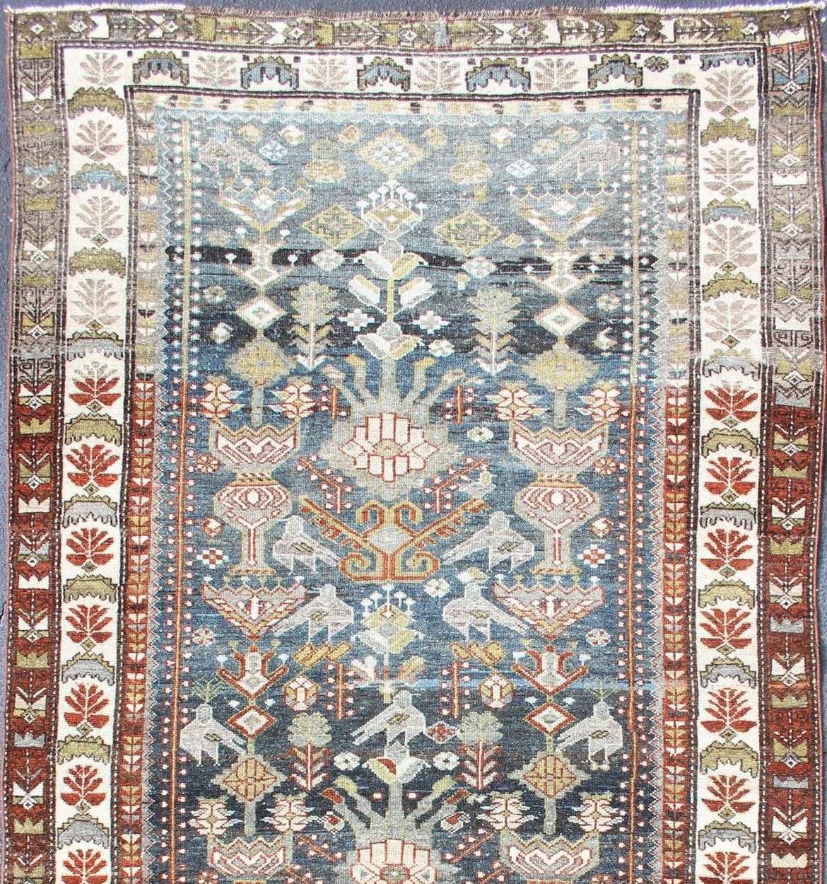 All-over Persian Earth antique Bakhtiari rug
Geometric motifs and design Bakhtiari rug in steel blue and grayish-blue color tones, rug R20-0701, origin / type: Iran / Bakhtiari, circa 1930

This beautiful antique Bakhtiari rug from Persia