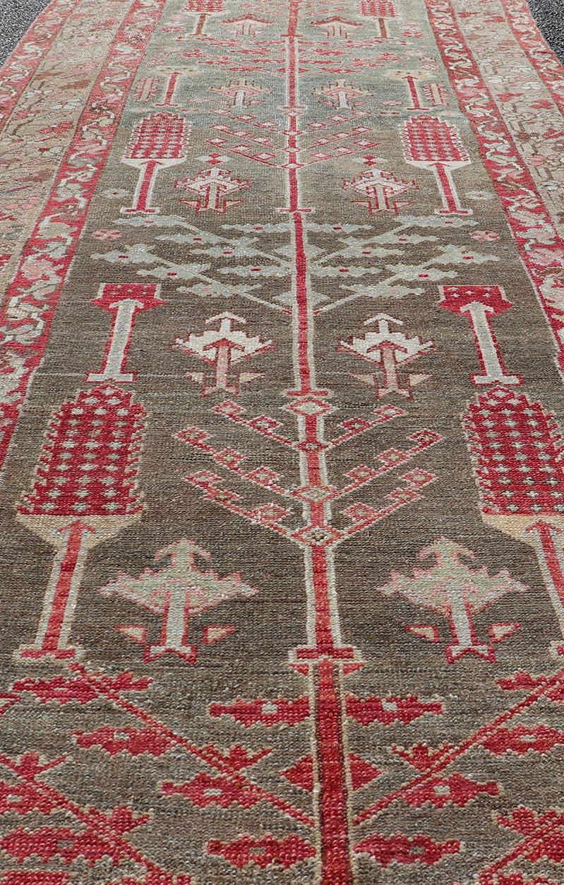 20th Century  Antique Persian Bakhitari Runner with All-Over Patten in Light Blue Background For Sale