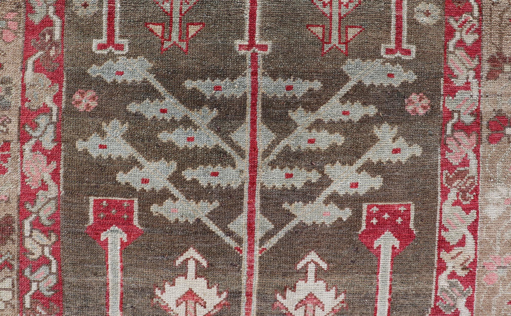 Wool  Antique Persian Bakhitari Runner with All-Over Patten in Light Blue Background For Sale