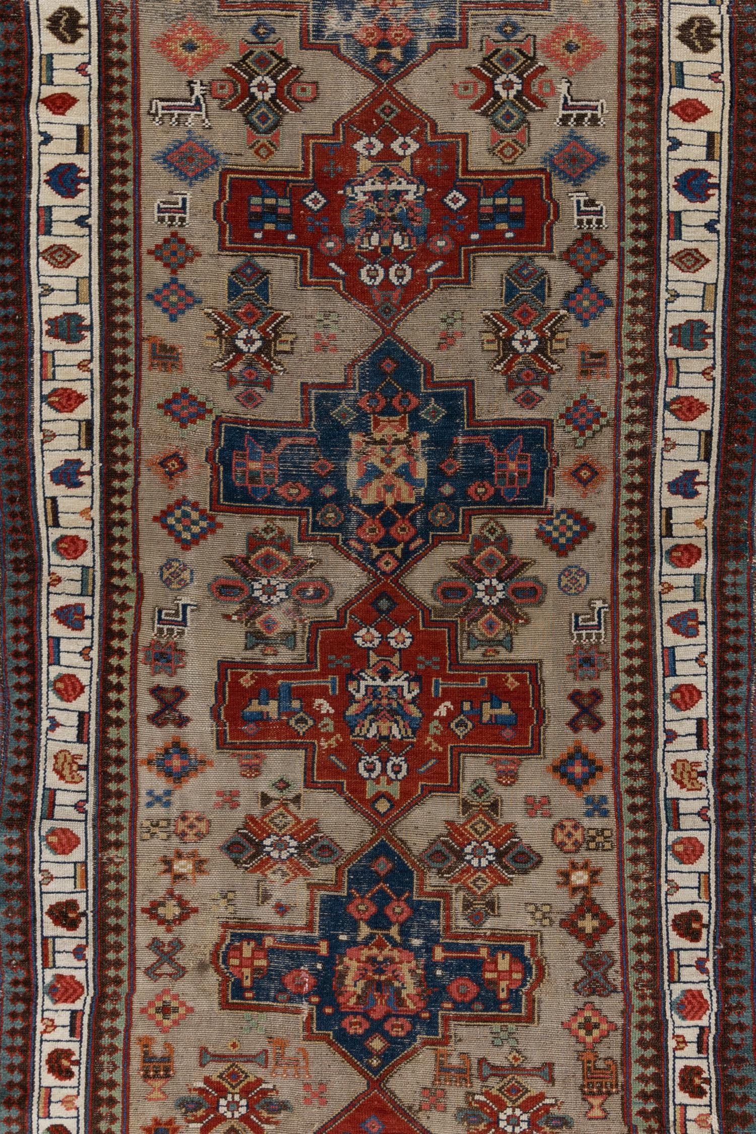 Wool on wool foundation with a beautiful camel toned field. Soft underfoot and classic in coloration.
 
Wear Notes: 8

Wear Guide:
Vintage and antique rugs are by nature, pre-loved and may show evidence of their past. There are varying degrees