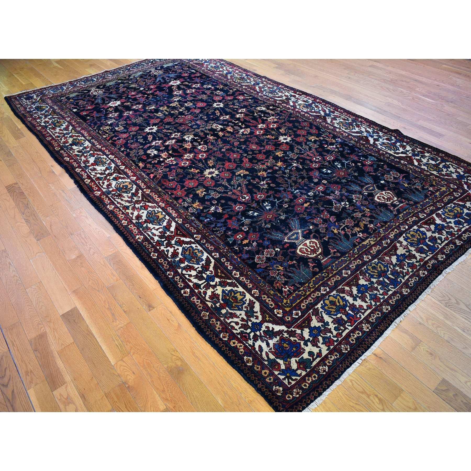 Medieval Antique Persian Bakhtiar Good Condition Longer Shape Worn Down Hand Knotted Rug For Sale