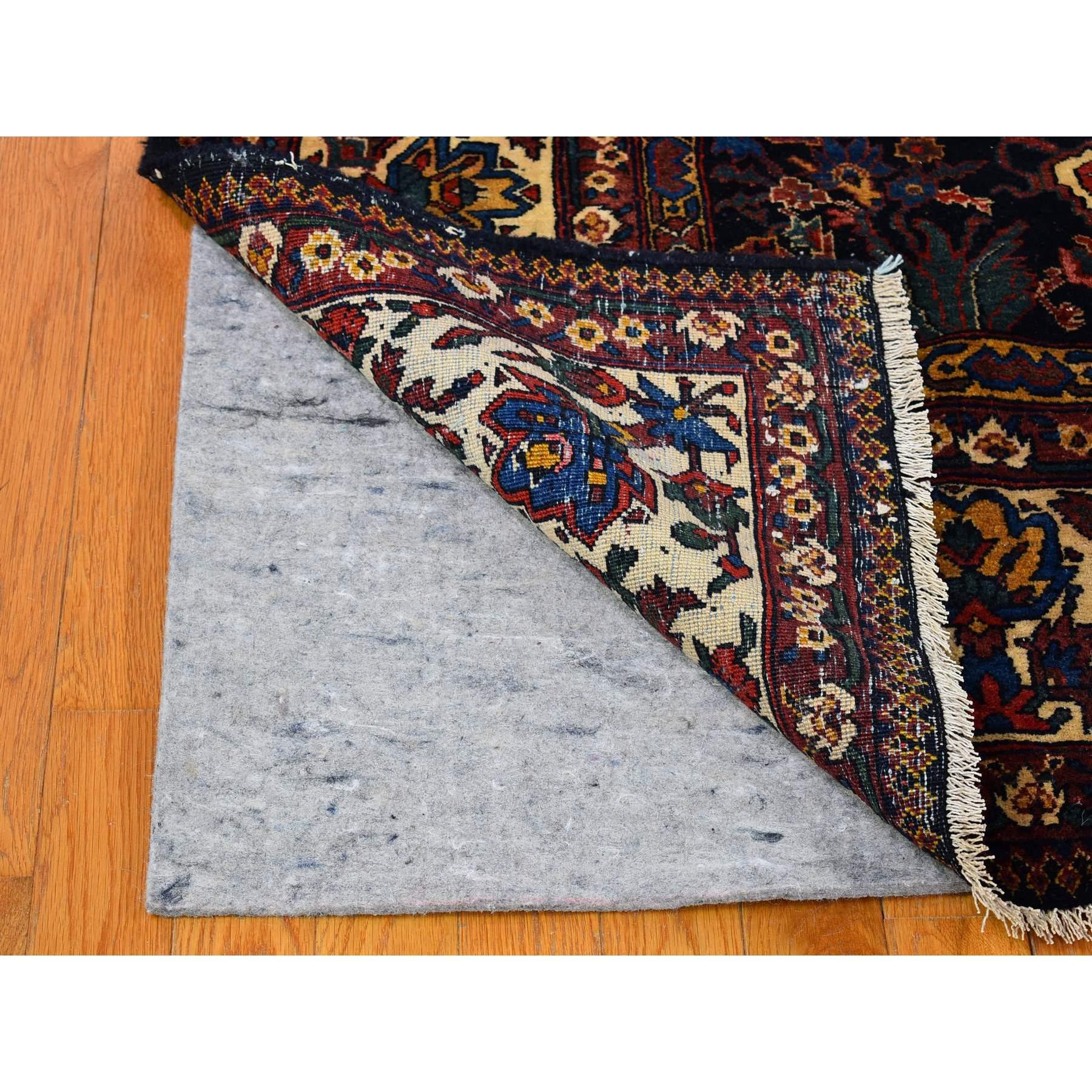 Antique Persian Bakhtiar Good Condition Longer Shape Worn Down Hand Knotted Rug For Sale 1