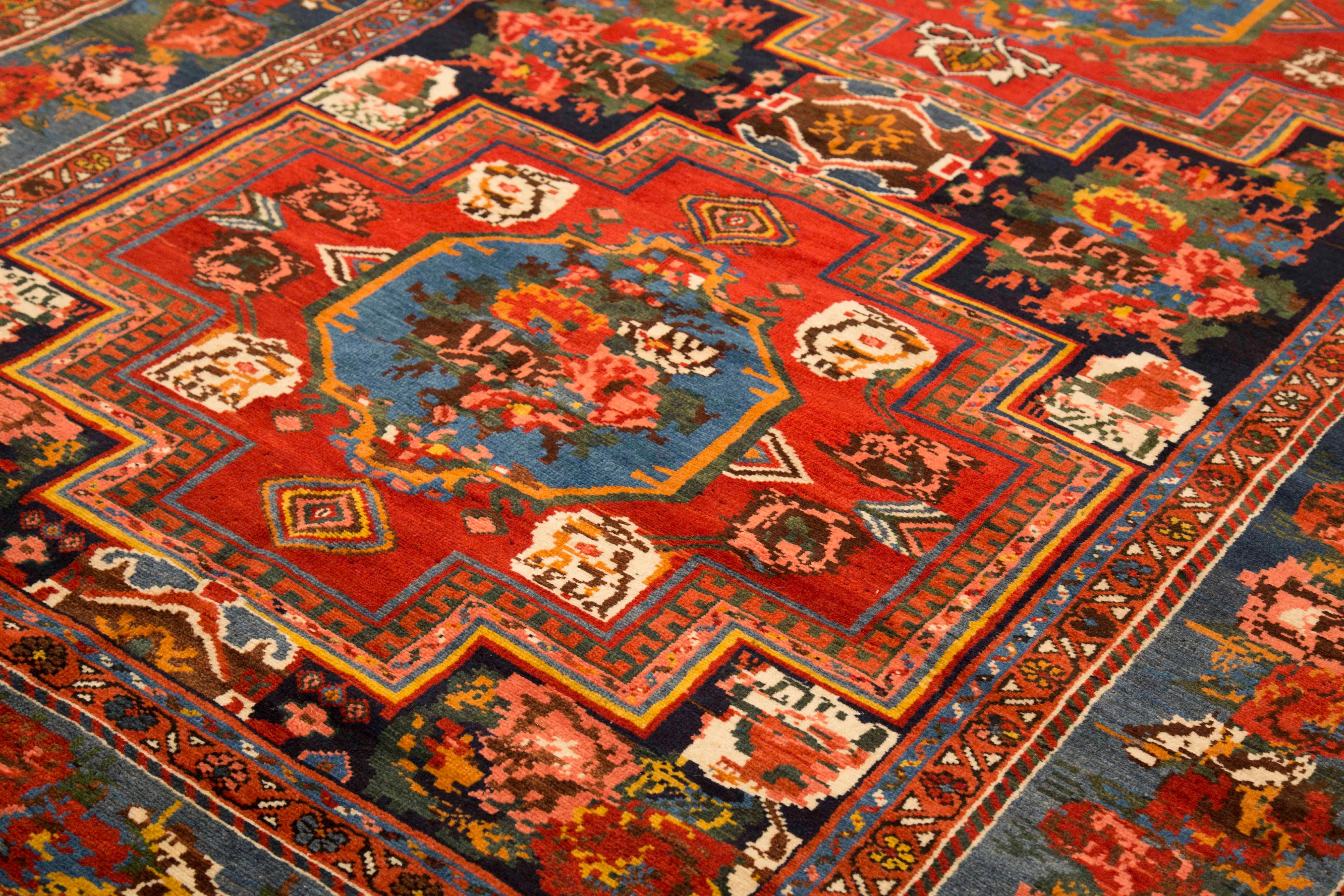 Other Antique Persian Bakhtiar Rug with Blue and Red Floral Medallions For Sale