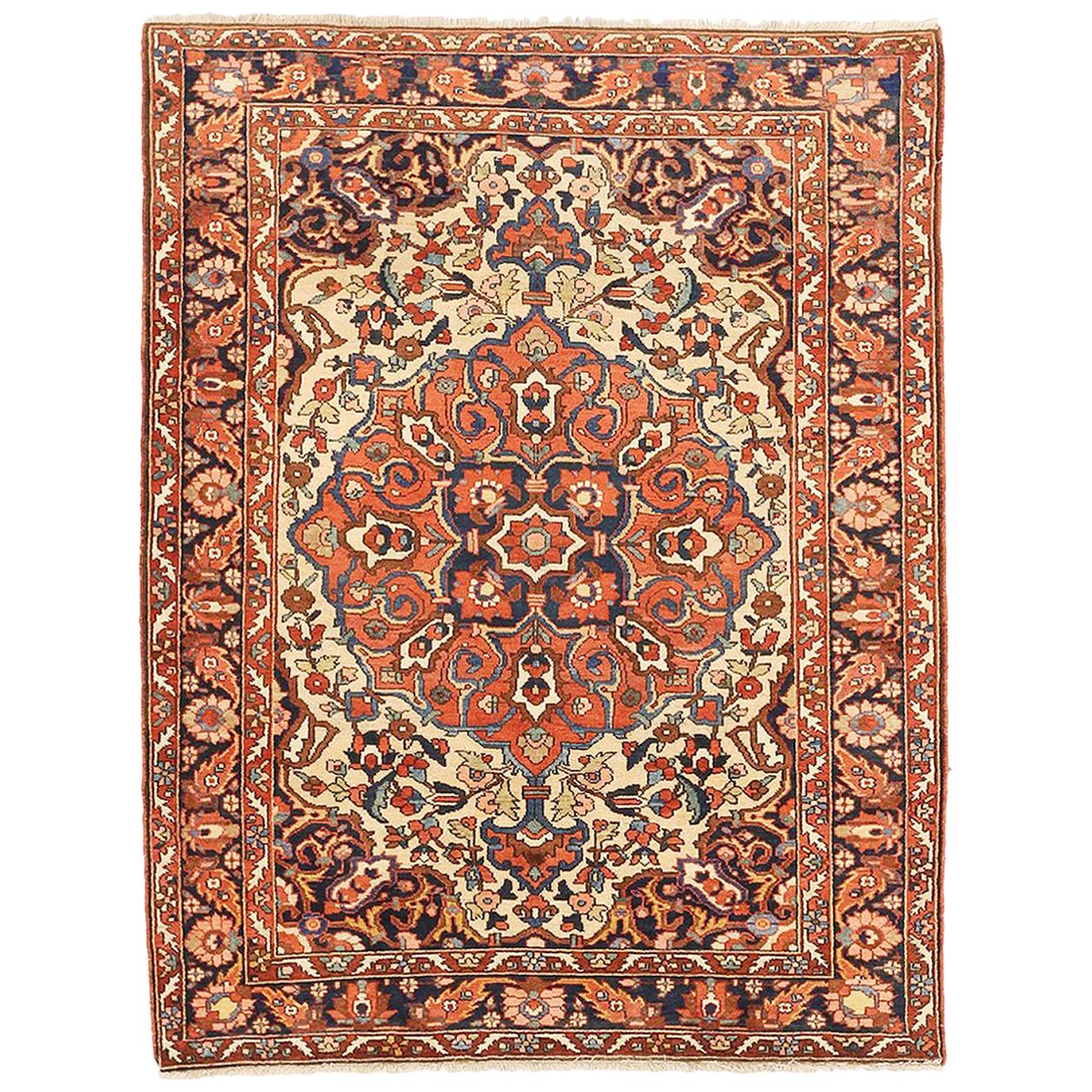 Antique Persian Bakhtiar Rug with Brown & Navy Floral Medallion at Center Field For Sale