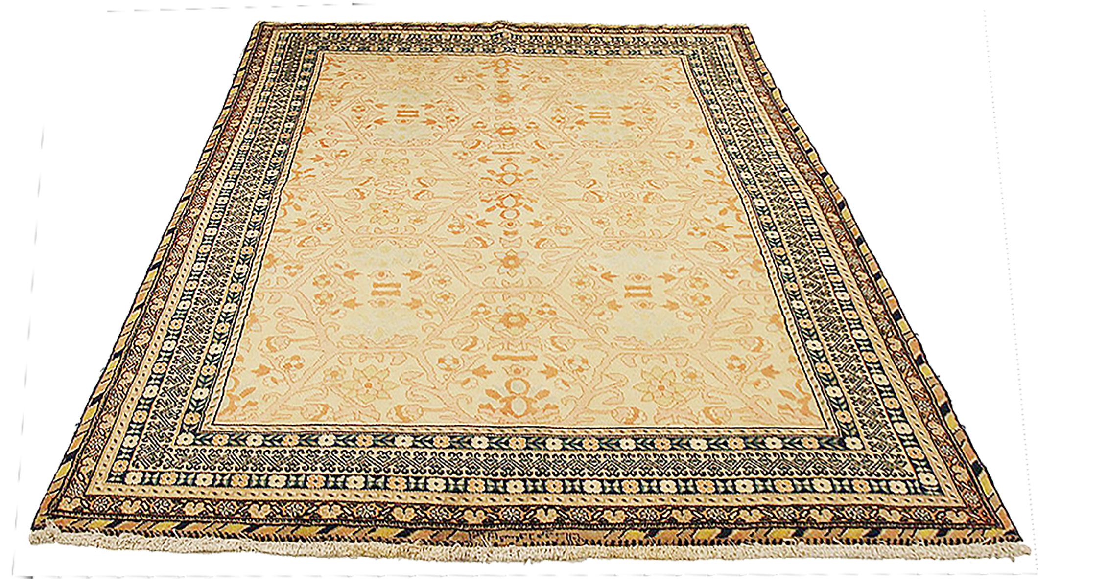 Antique Persian rug handwoven from the finest sheep’s wool and colored with all-natural vegetable dyes that are safe for humans and pets. It’s a traditional Bakhtiar design highlighted by colored diamonds over an ivory field. It’s a beautiful piece