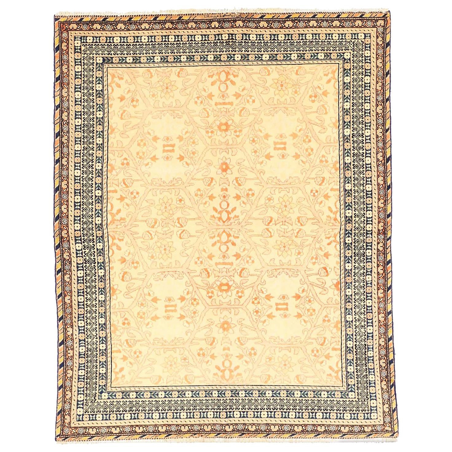 Antique Persian Bakhtiar Rug with Brown and Pink Floral Details on Ivory Field