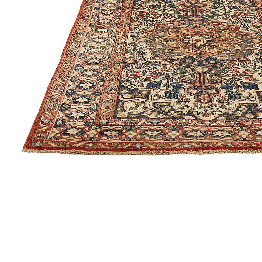 Hand-Woven Antique Persian Bakhtiar Rug with Green and Blue Floral Details on Ivory Field For Sale