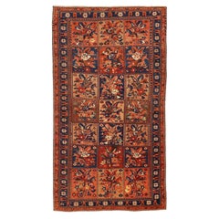 Vintage Persian Bakhtiar Rug with Navy and Red Flower Details on Beige Field