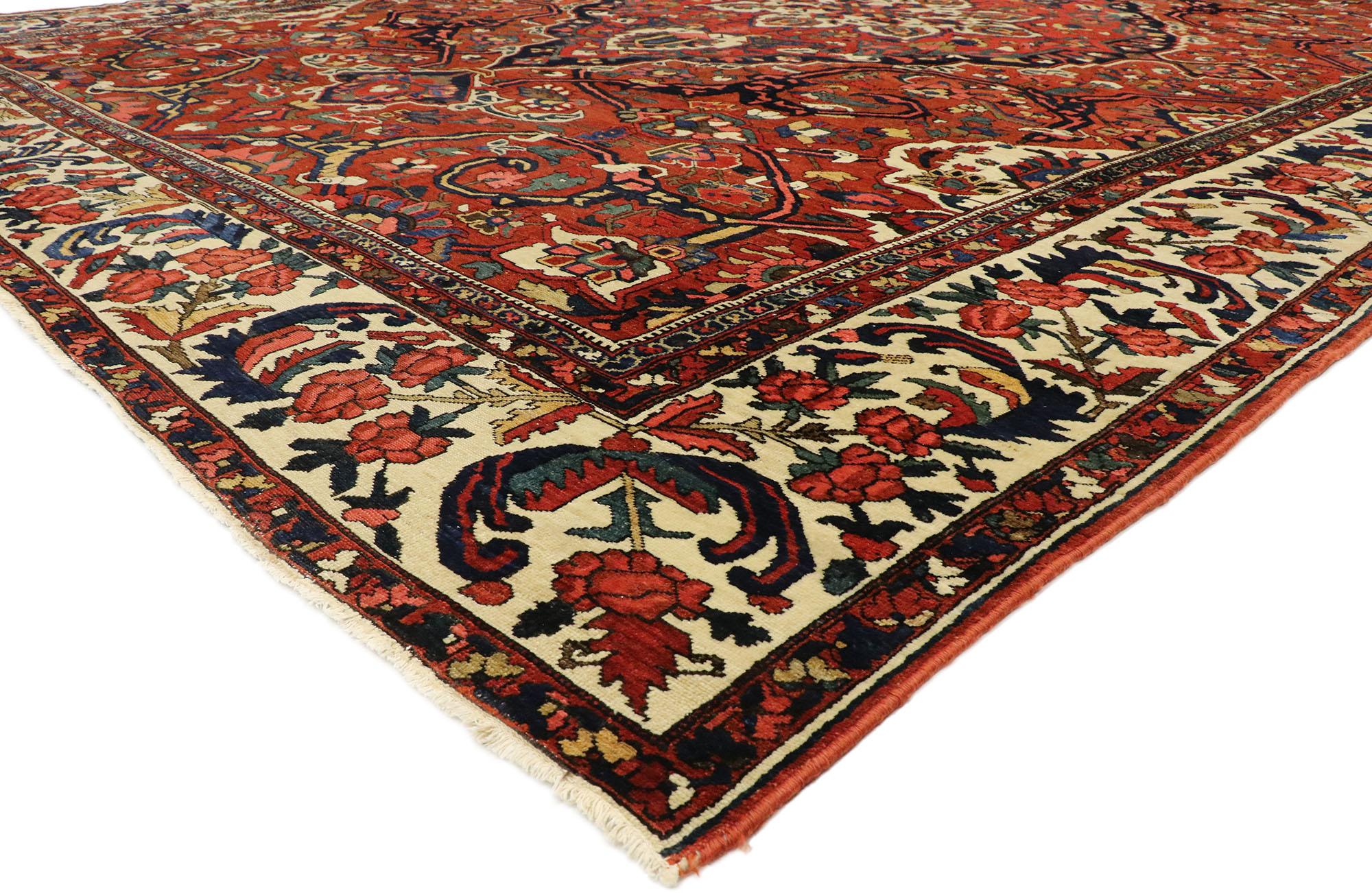 76757 Antique Persian Bakhtiari Rug, 13'02 x 17'04.

Immerse yourself in the regal heritage of the Bakhtiari tribespeople from the rugged Zagros Mountains, as classic elegance seamlessly converges with the sophistication reminiscent of Ivy League