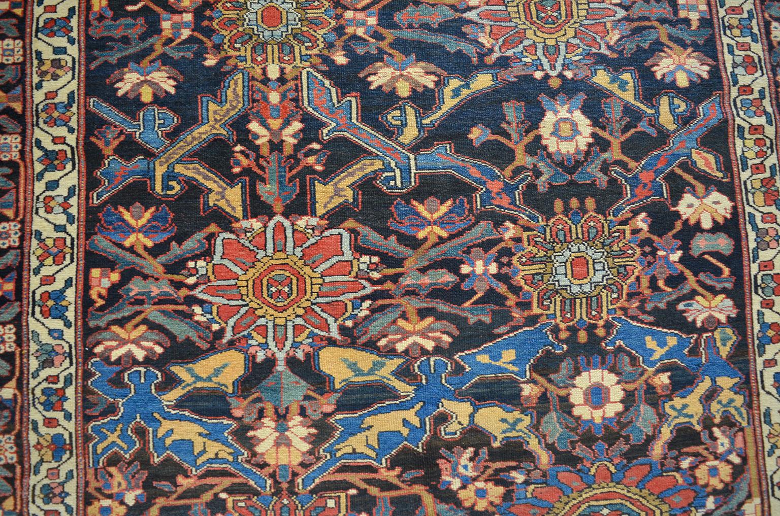 This antique Persian Bakhtiari carpet in pure handspun wool circa 1880 utilizes a hand knotted Bakhtiari weave and organic vegetable dyes. Originating from the village of Chaal-e Shotor, this carpet is characterized by its overall geometric design