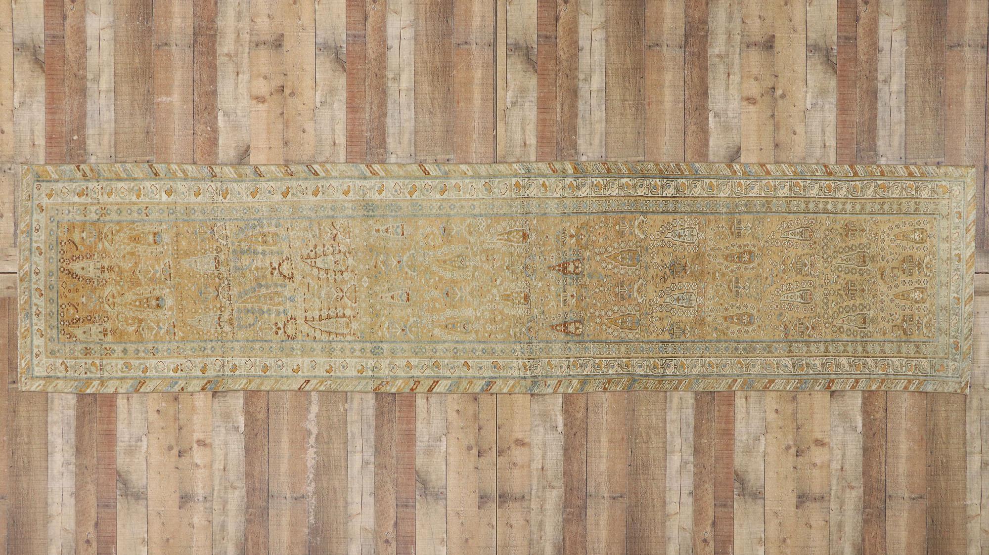 53253, antique Persian Bakhtiari Cypress Tree Runner with British Colonial style. With a subdued appearance and cypress tree design in neutral hues, this hand knotted wool antique Persian Bakhtiari runner charms with ease and beautifully embodies