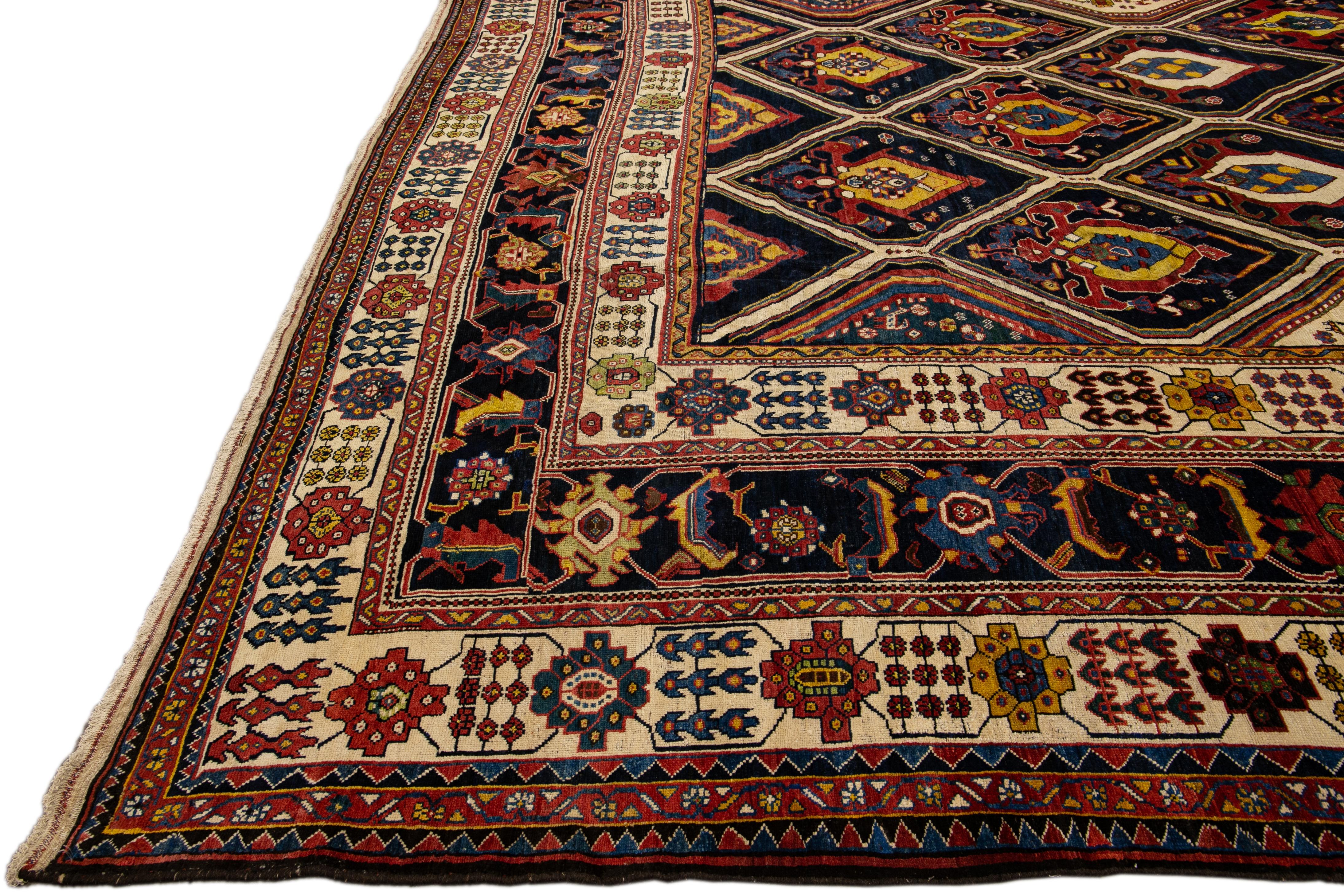 Hand-Knotted Antique Persian Bakhtiari Handmade Allover Designed Multicolor Oversize Wool Rug For Sale