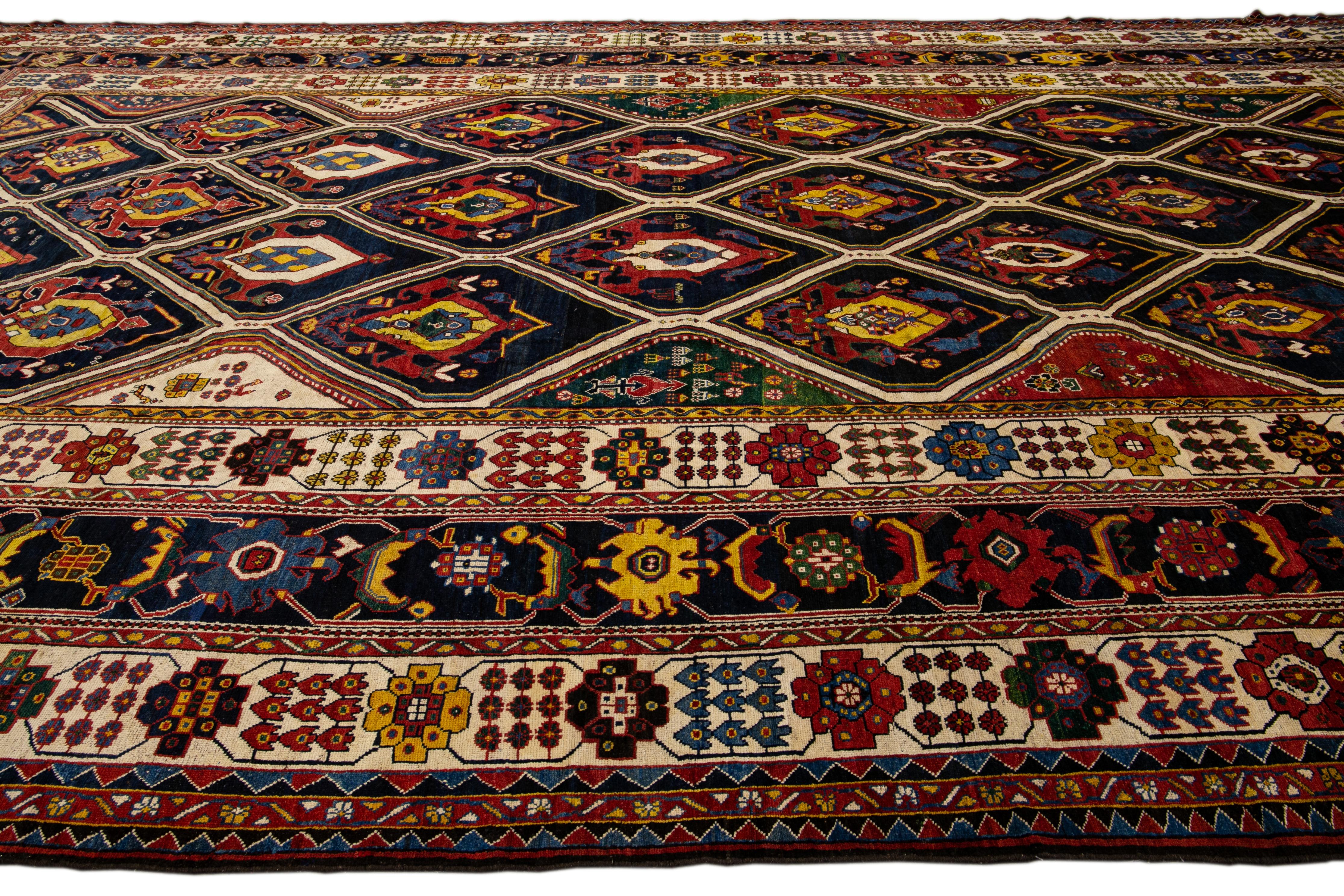 Antique Persian Bakhtiari Handmade Allover Designed Multicolor Oversize Wool Rug In Good Condition For Sale In Norwalk, CT