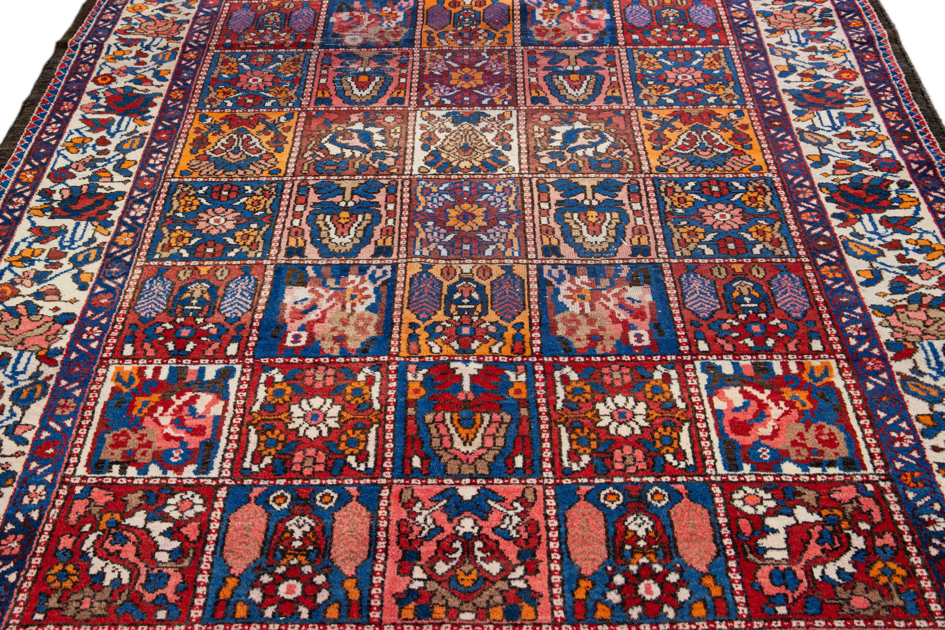 Islamic Antique Persian Bakhtiari Handmade Allover Pattern Multicolor Wool Rug For Sale