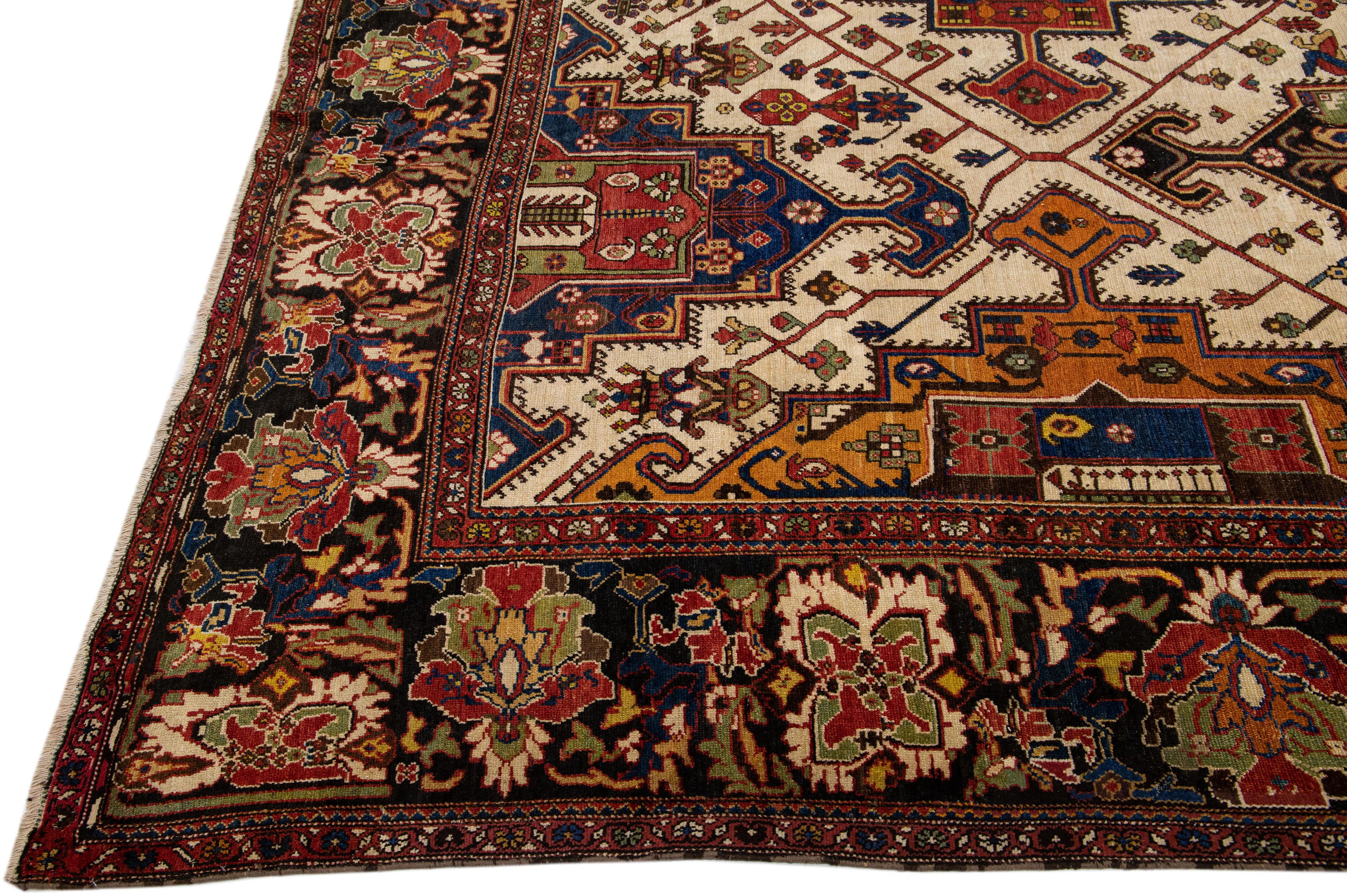 Hand-Knotted Antique Persian Bakhtiari Handmade Multicolor Geometric Wool Rug For Sale