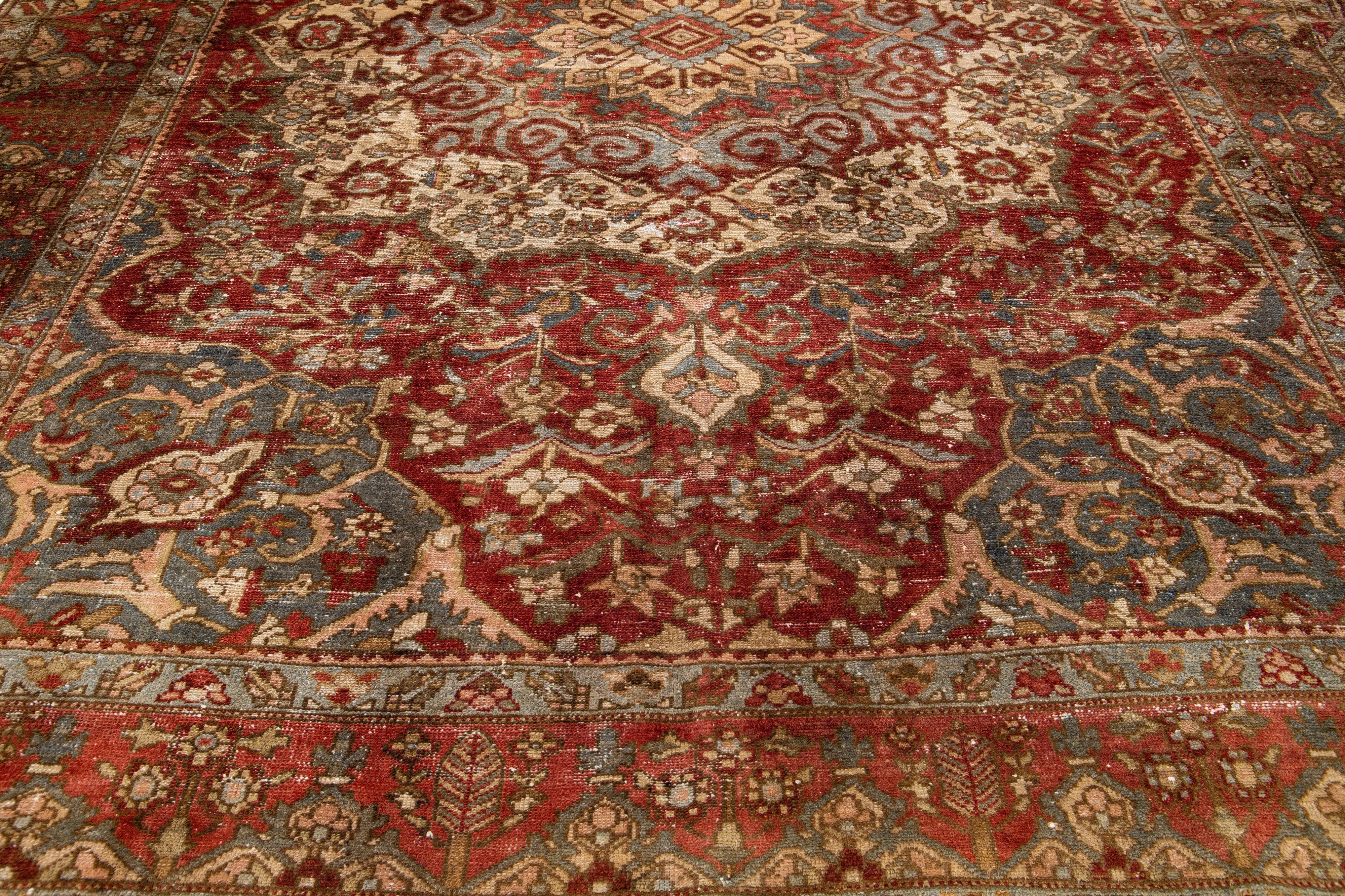 20th Century Antique Persian Bakhtiari Handmade Rust Rosette Wool Rug For Sale