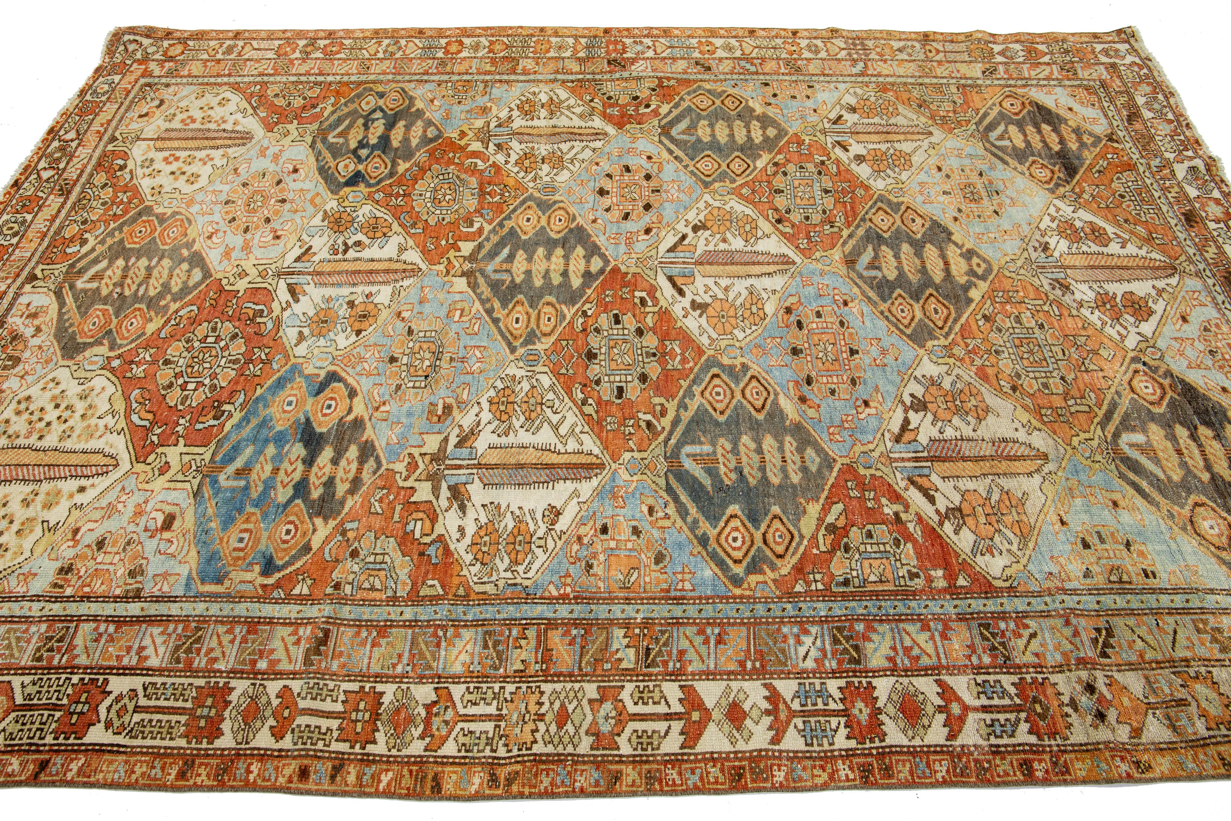 Hand-Knotted Antique Persian Bakhtiari Handmade Wool Rug With Allover Multicolor Design For Sale